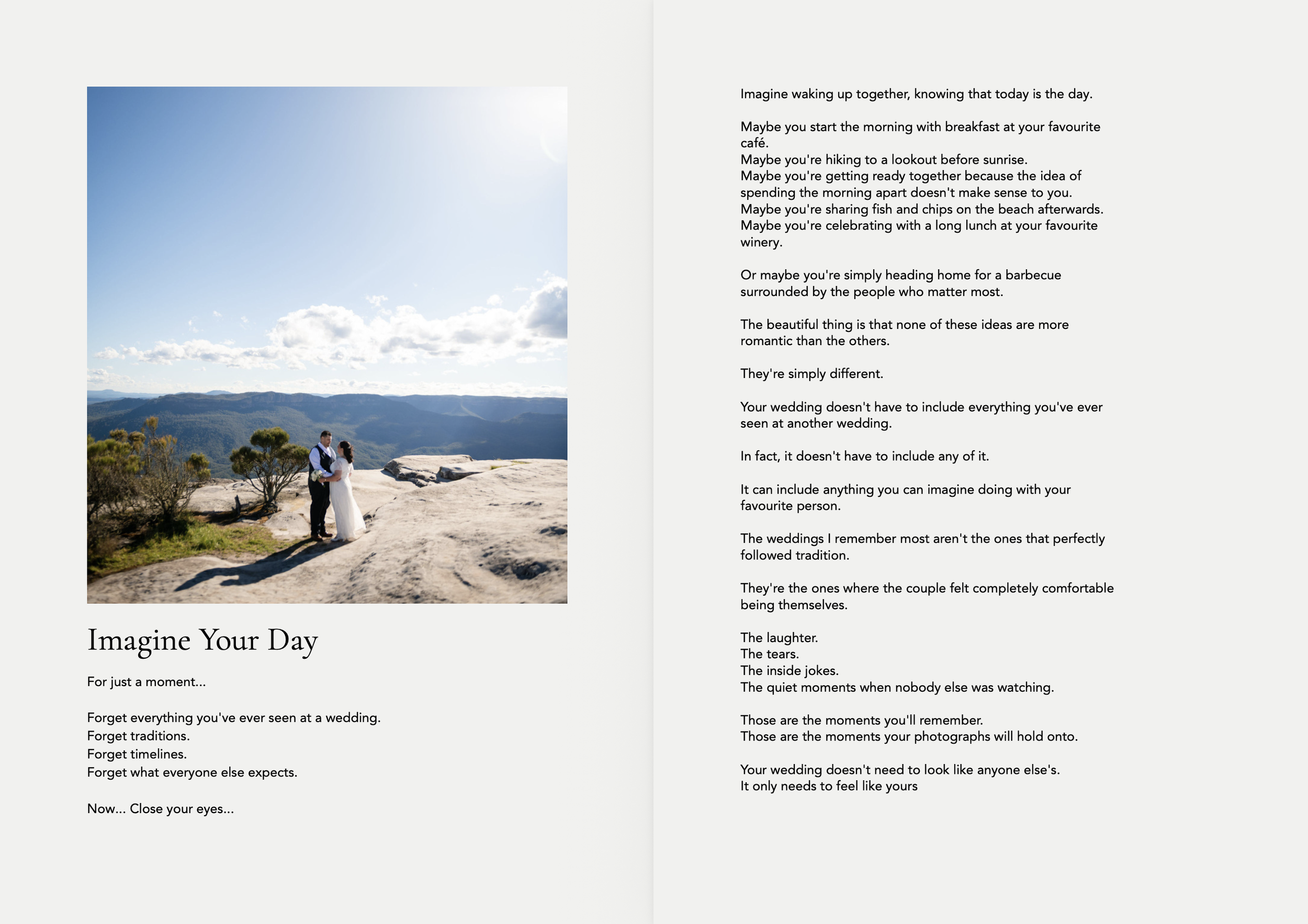 A couple in wedding attire standing on a rocky landscape with mountains and a blue sky with clouds in the background.
