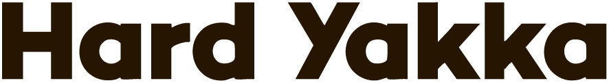 Hard Yakka clothing brand logo in brown