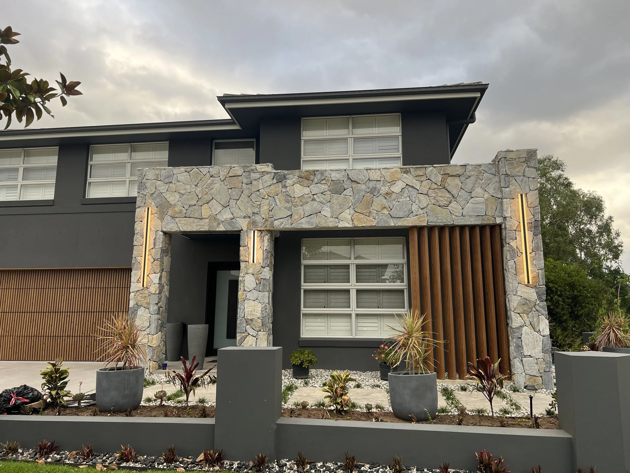 Modern house new electrical lighting installed on the front
