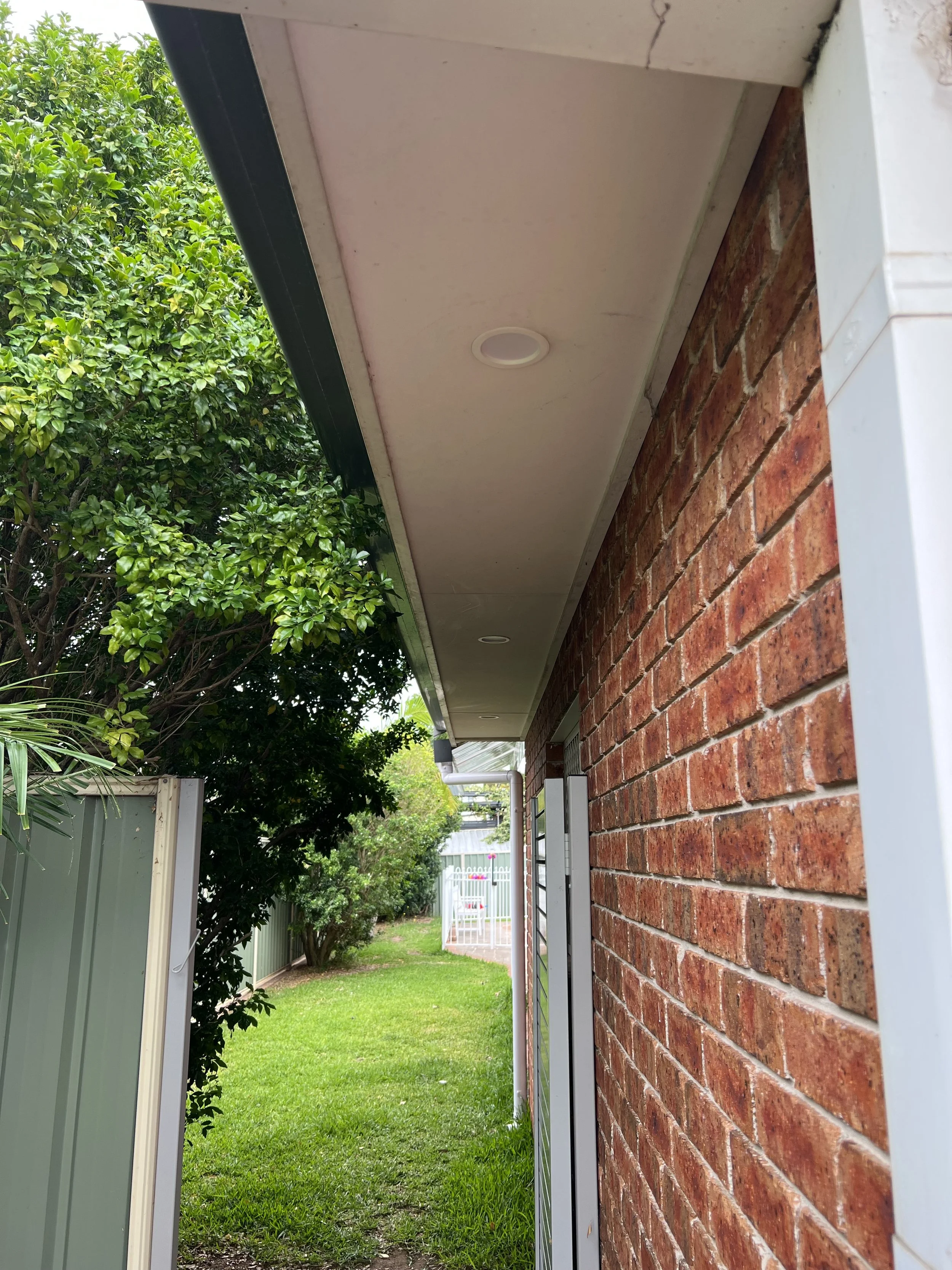 Overhanging roof with down lighting installed in a residential home in Campbelltown