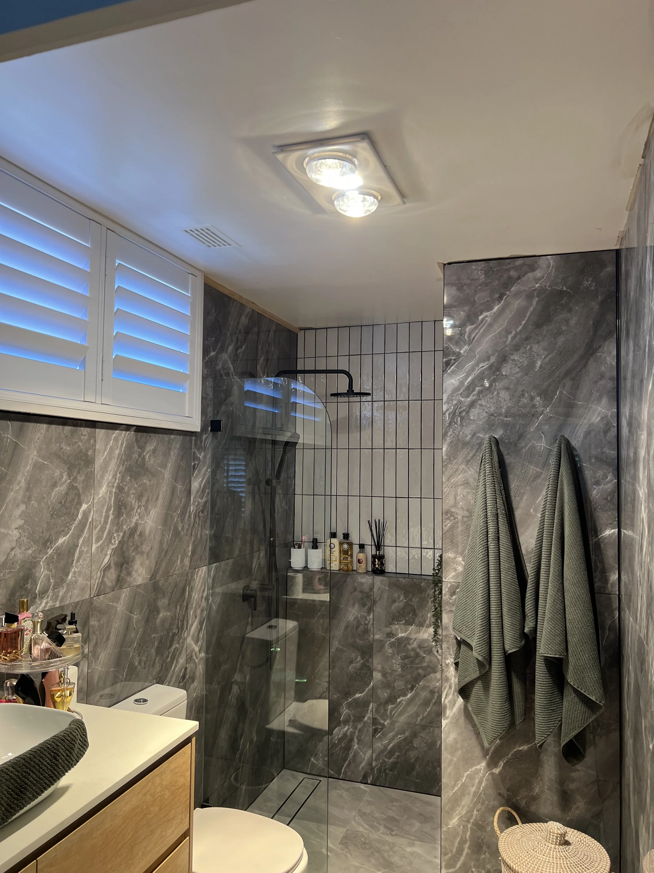 Bathroom with heater lights and fan 3in1 tastic for a customers home in Bradbury