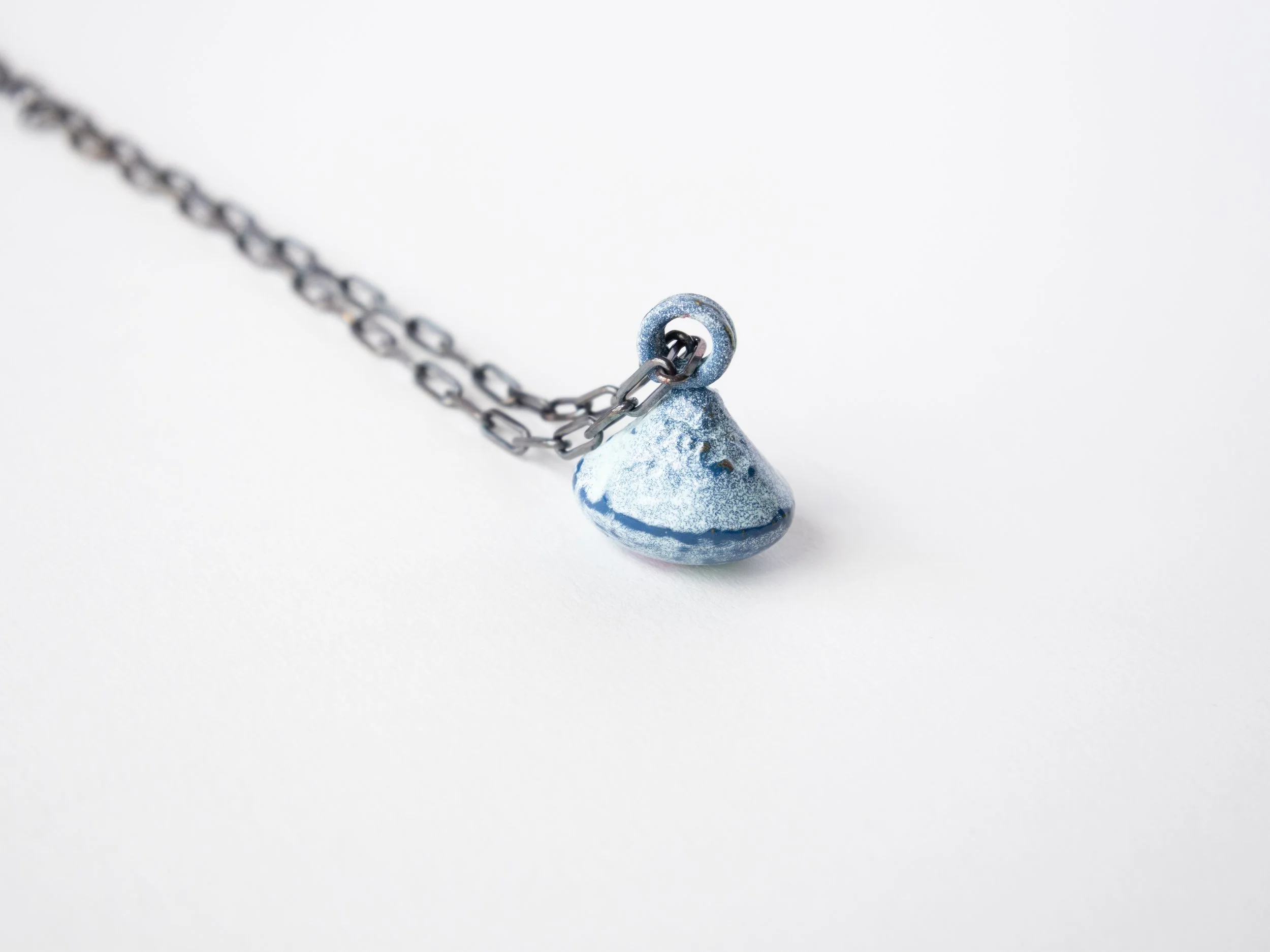 The Butt: White & Navy Pendant with Silver Chain