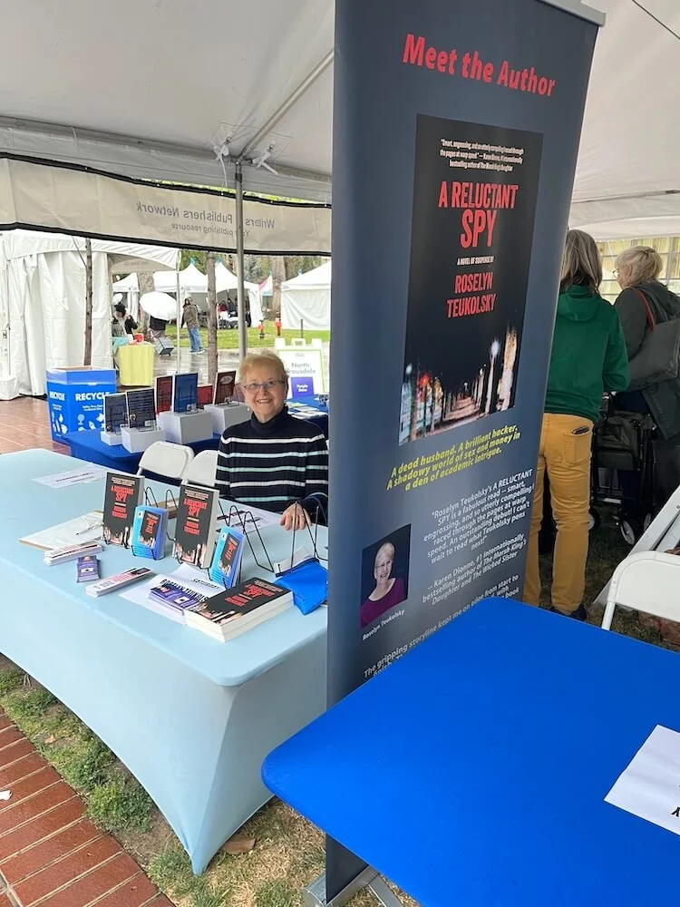 Ros Setting up in rain.JPG