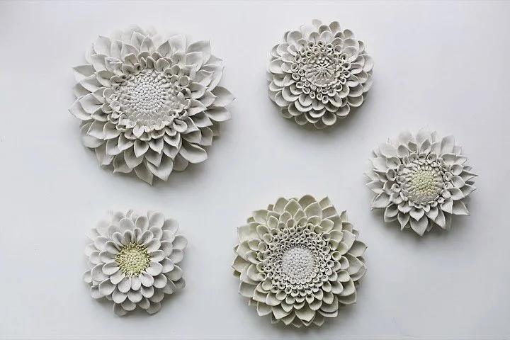 Dahlias in porcelain, sculptural, delicate, and forever in bloom. 

#porcelain #porcelainartist #wallsculpture #sculpture #keramiek