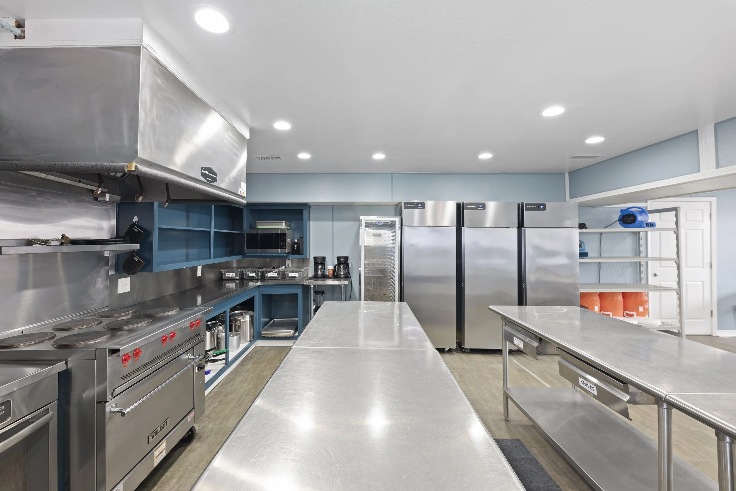 Our kitchen is a chef's dream, with spacious workstations and a full suite of professional-grade tools.
