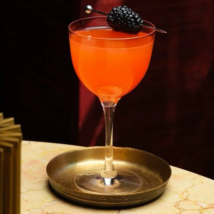 Red Sunset&hellip; made with Aperol, vanilla citrus &amp; peach reduction 🍑