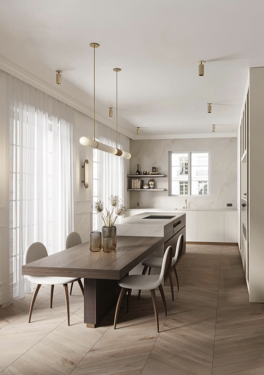 Timber dining table at dining height attached to a kitchen island bench, with dining chairs on both sides