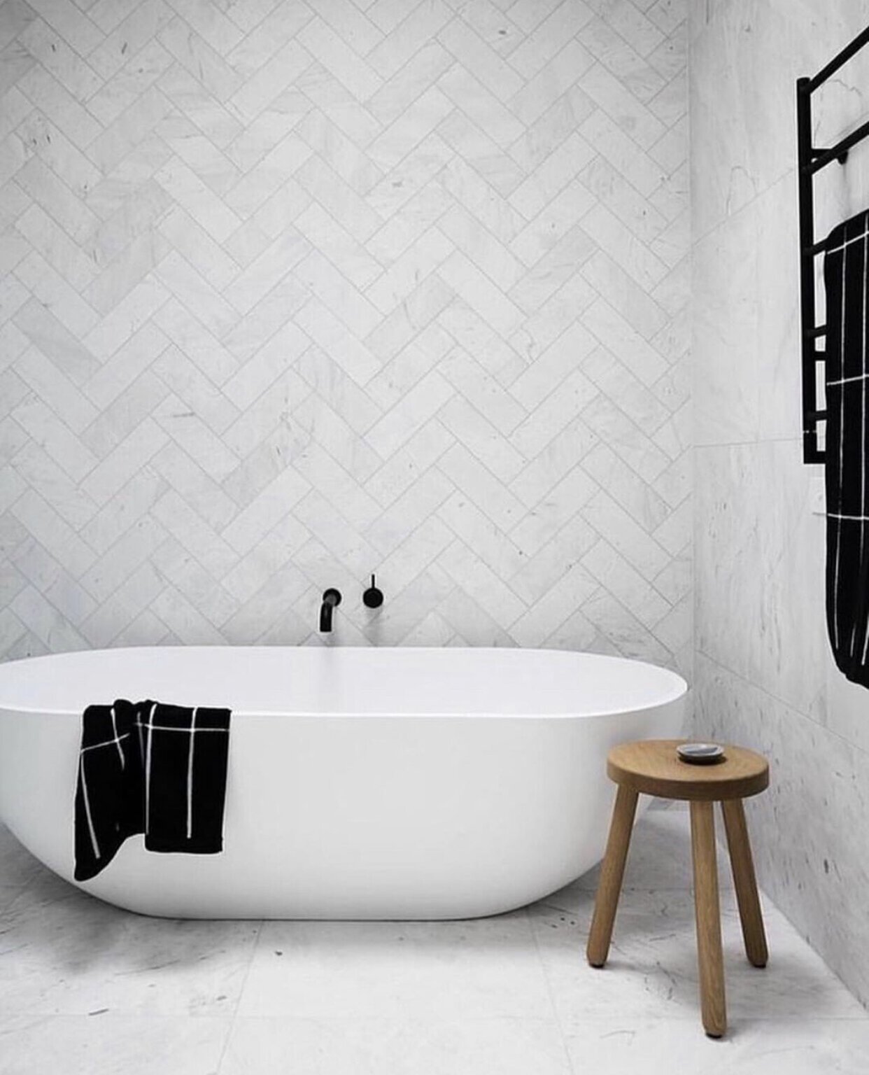 Studio Griffiths with herringbone bathroom tiles