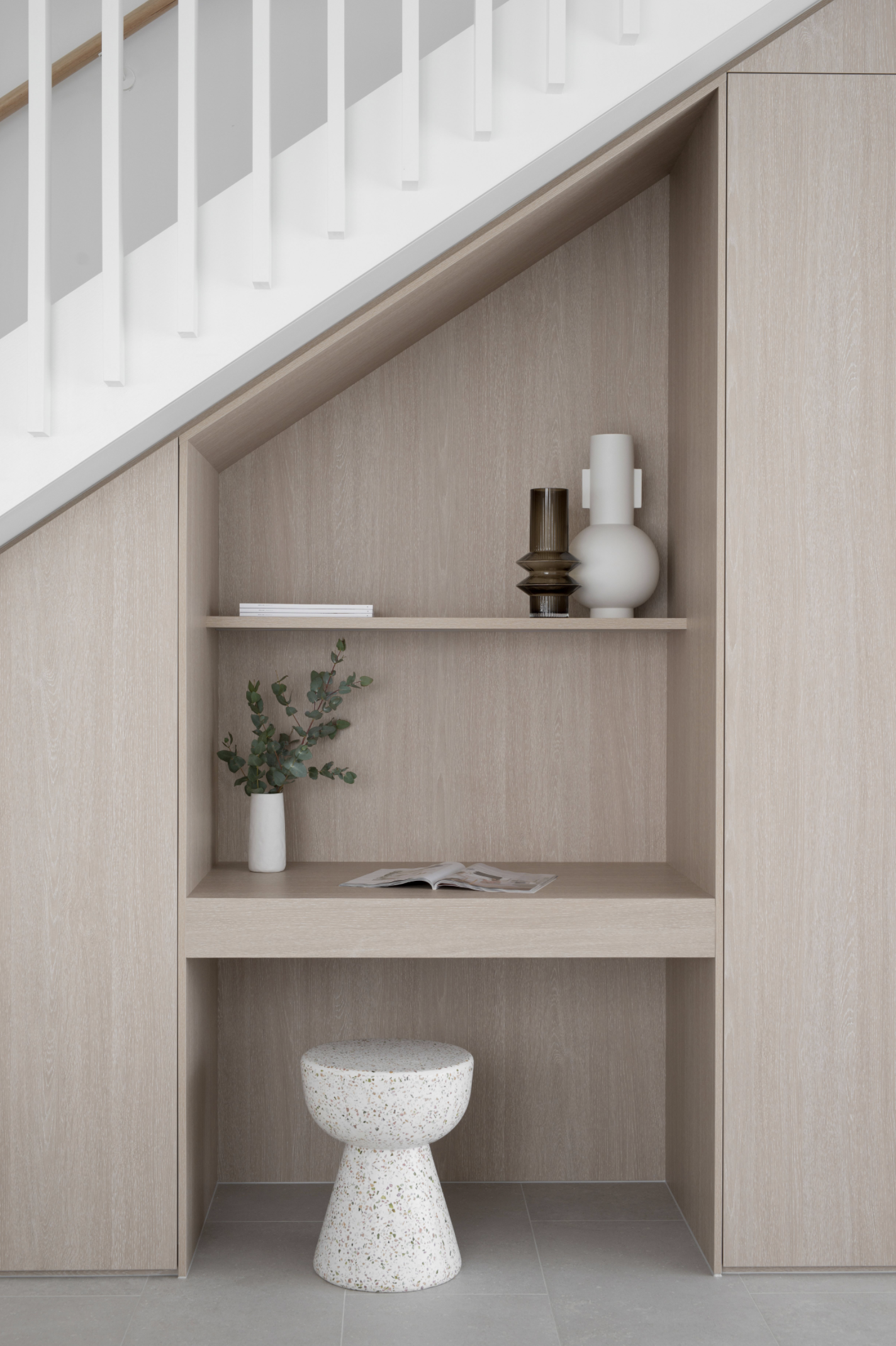 Under stair study nook design with built in desk and shelves design for home remodel