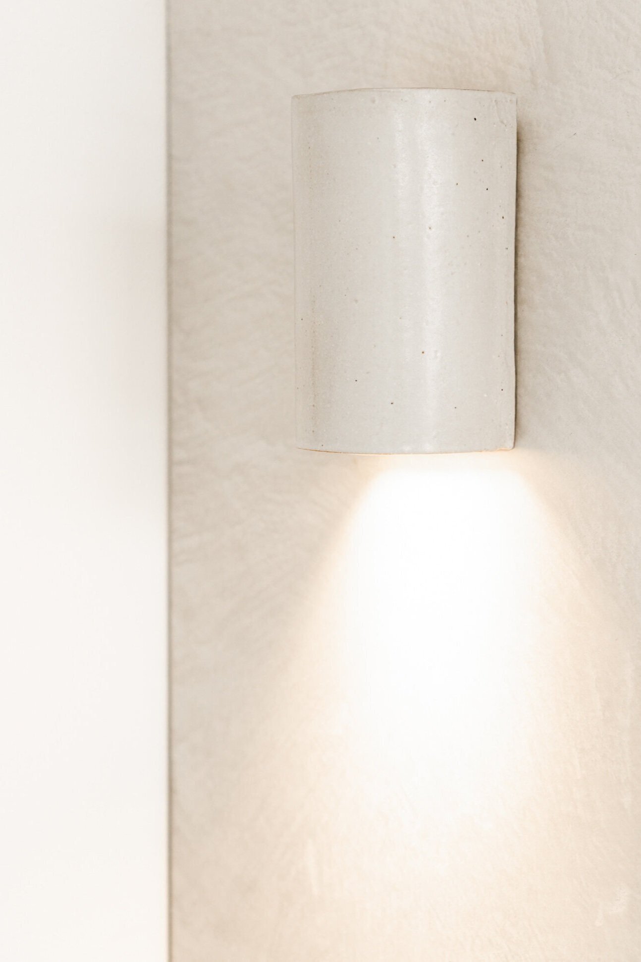 Ceramic wall lamp design by we ponder