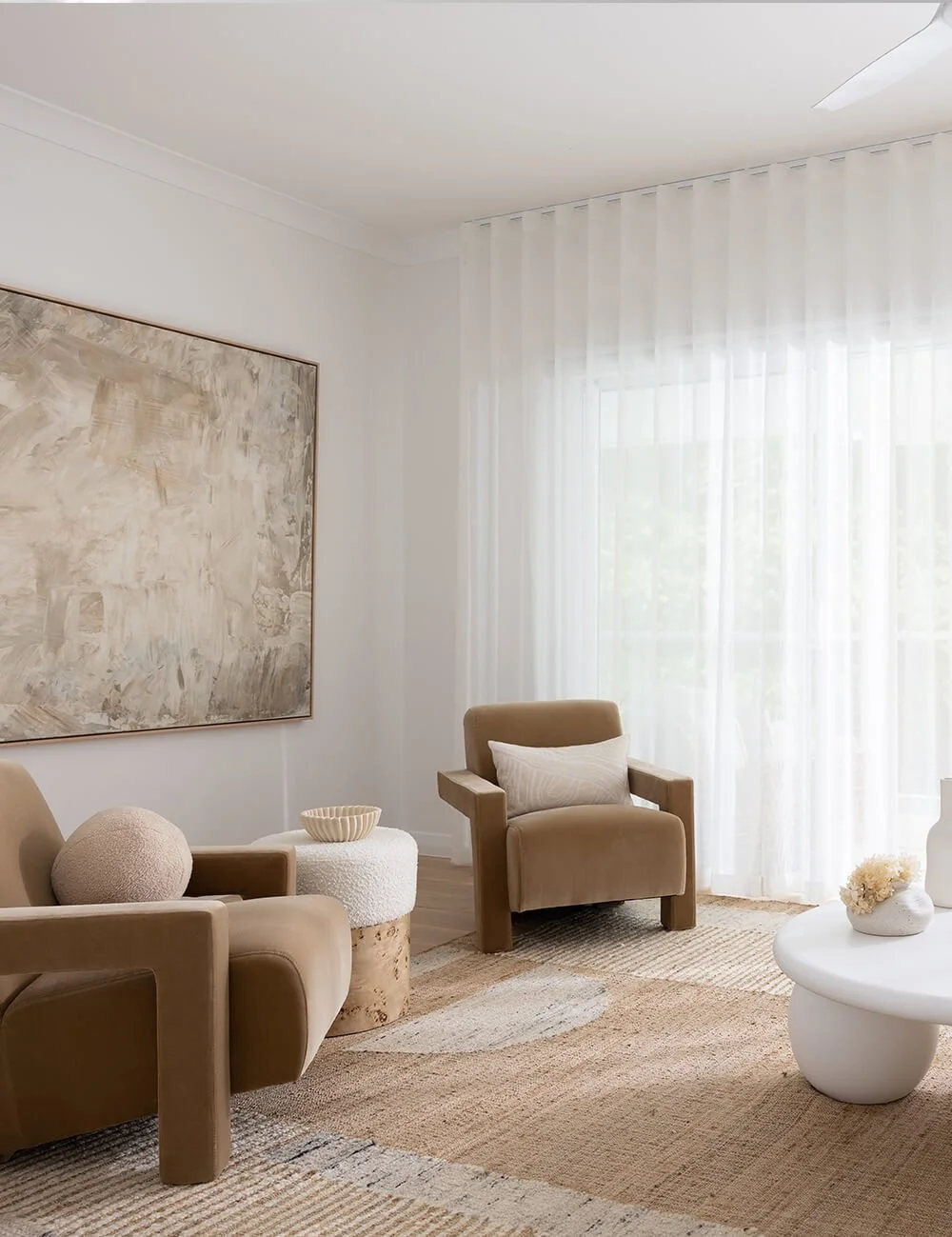 Brown color scheme furniture and white sheer curtains