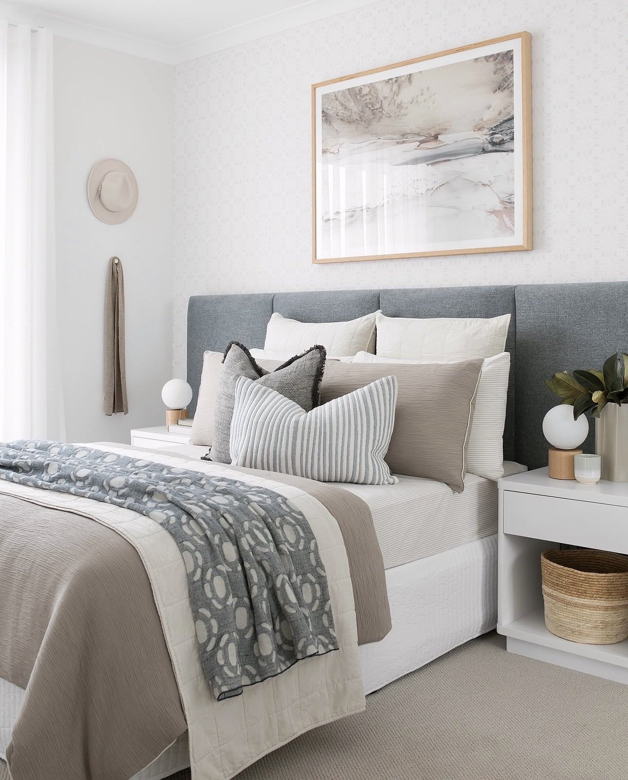 Bedroom layout with bedside tables either side of the bed and clear walking space around it