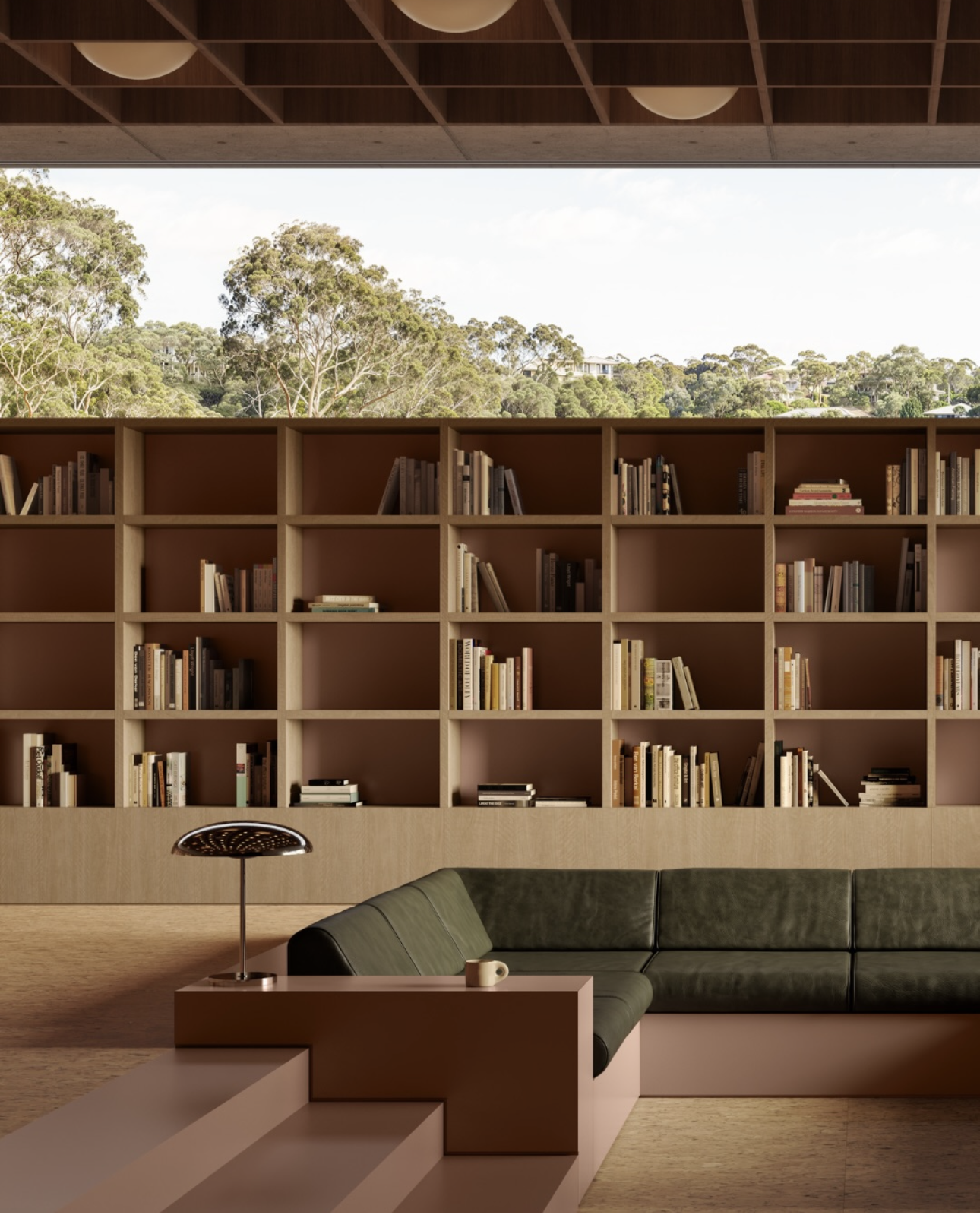 Sunken lounge with built-in green leather seating, stepped down in front of a wall of timber bookshelves.