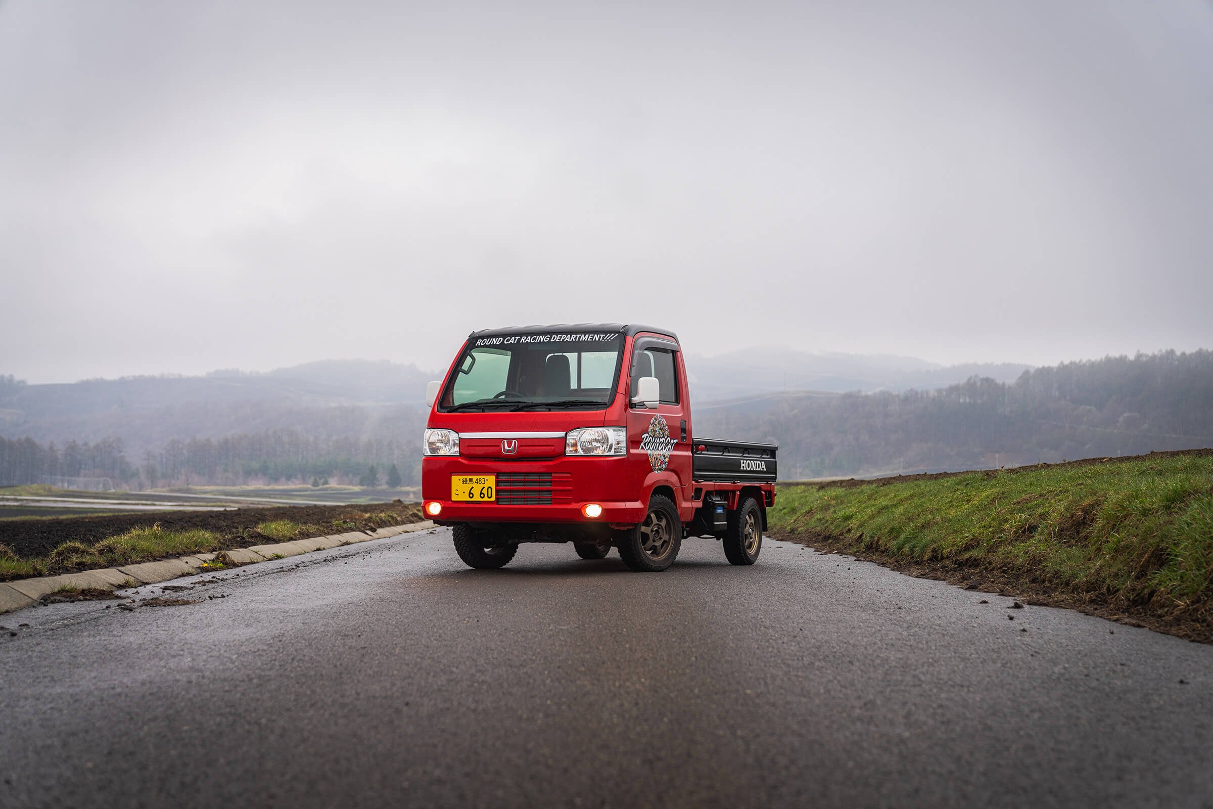 Red Honda Acty countryside RoundCat Rally.jpg