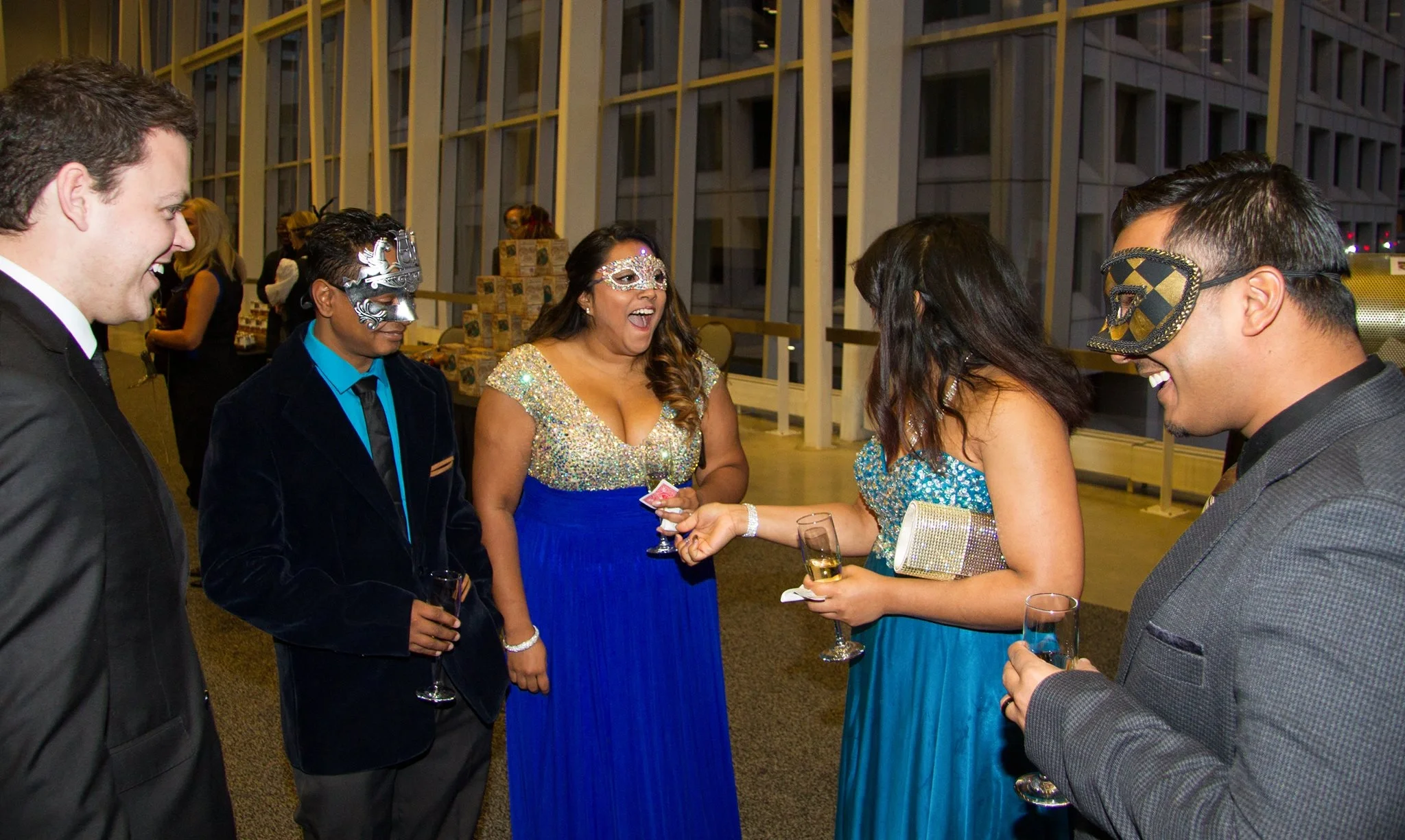 corporate gala guests reacting to a close-up magic trick from Winnipeg magician Patrick Gregoire
