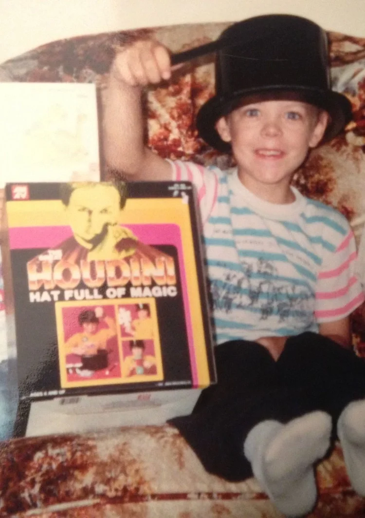 Winnipeg corporate magician Patrick Gregoire at 7 years old on his birthday with his very first magic kit