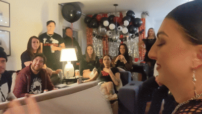 animated gif of house party guests reacting with shock at some mind reading from Winnipeg magician Patrick Gregoire