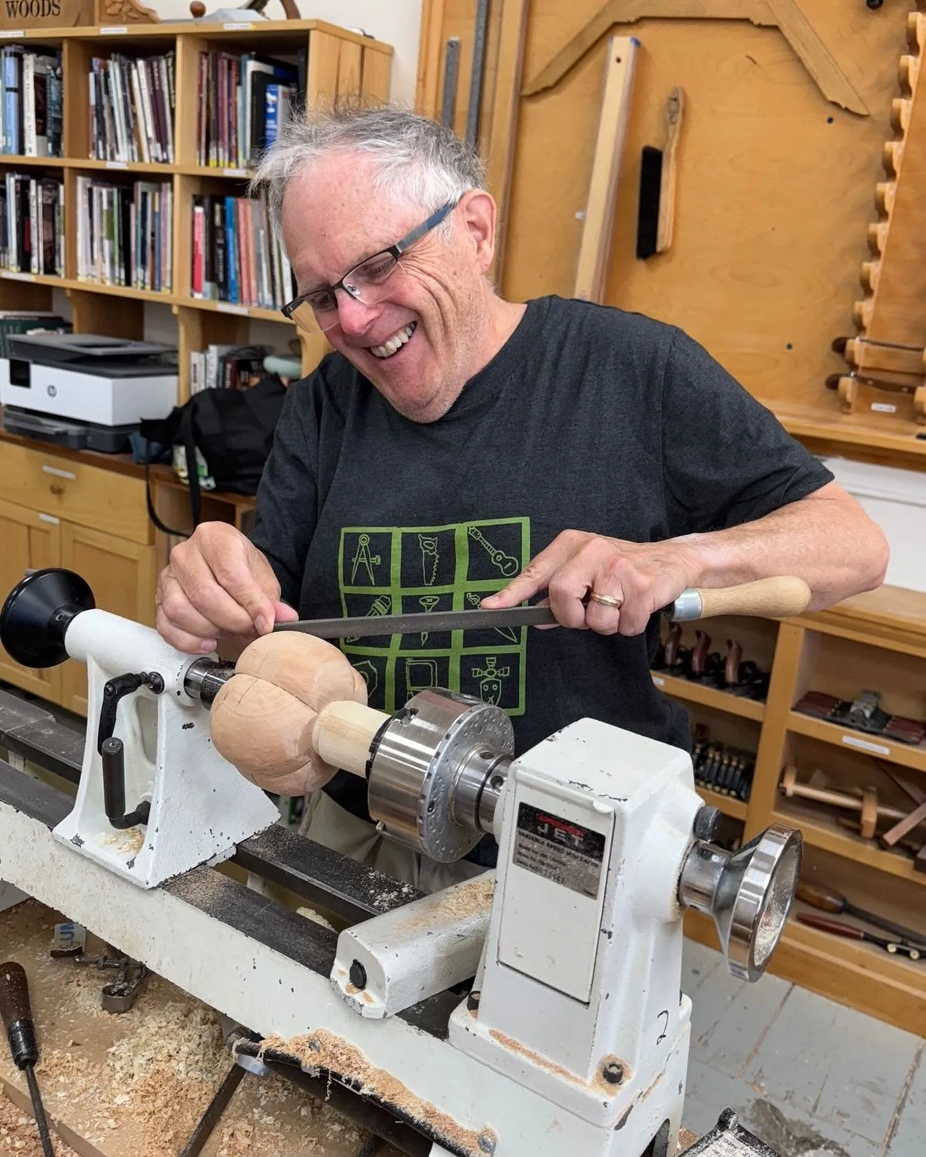 Mike Waddell is offset turning in his new essential tools tee shirt from @bethirelandstudio  He created a tomato with off set techniques! 
#woodworking #offsetturning #woodturning #porttownsendschoolofwoodworking