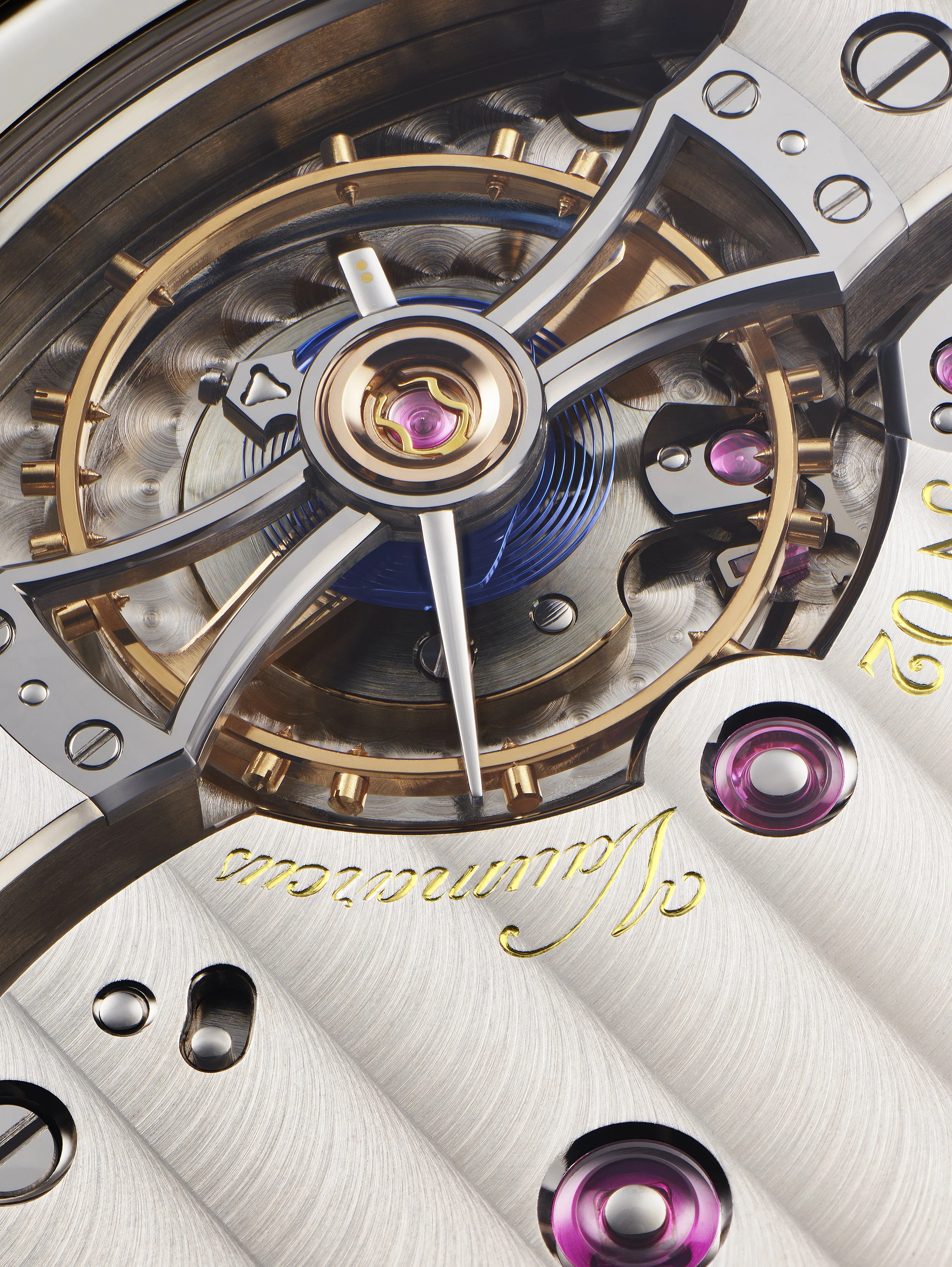 Close-up of a luxury watch movement showing intricate gears, screws, and the balance wheel with a visible blue hairspring.