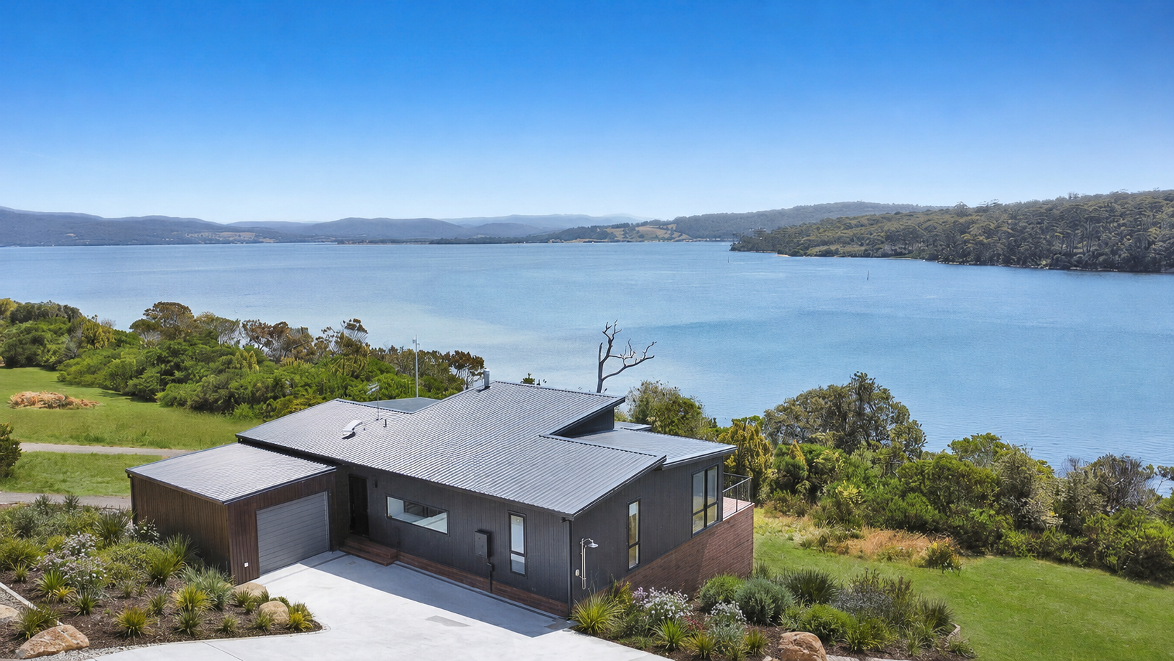 Aerial image of the house with bay.png