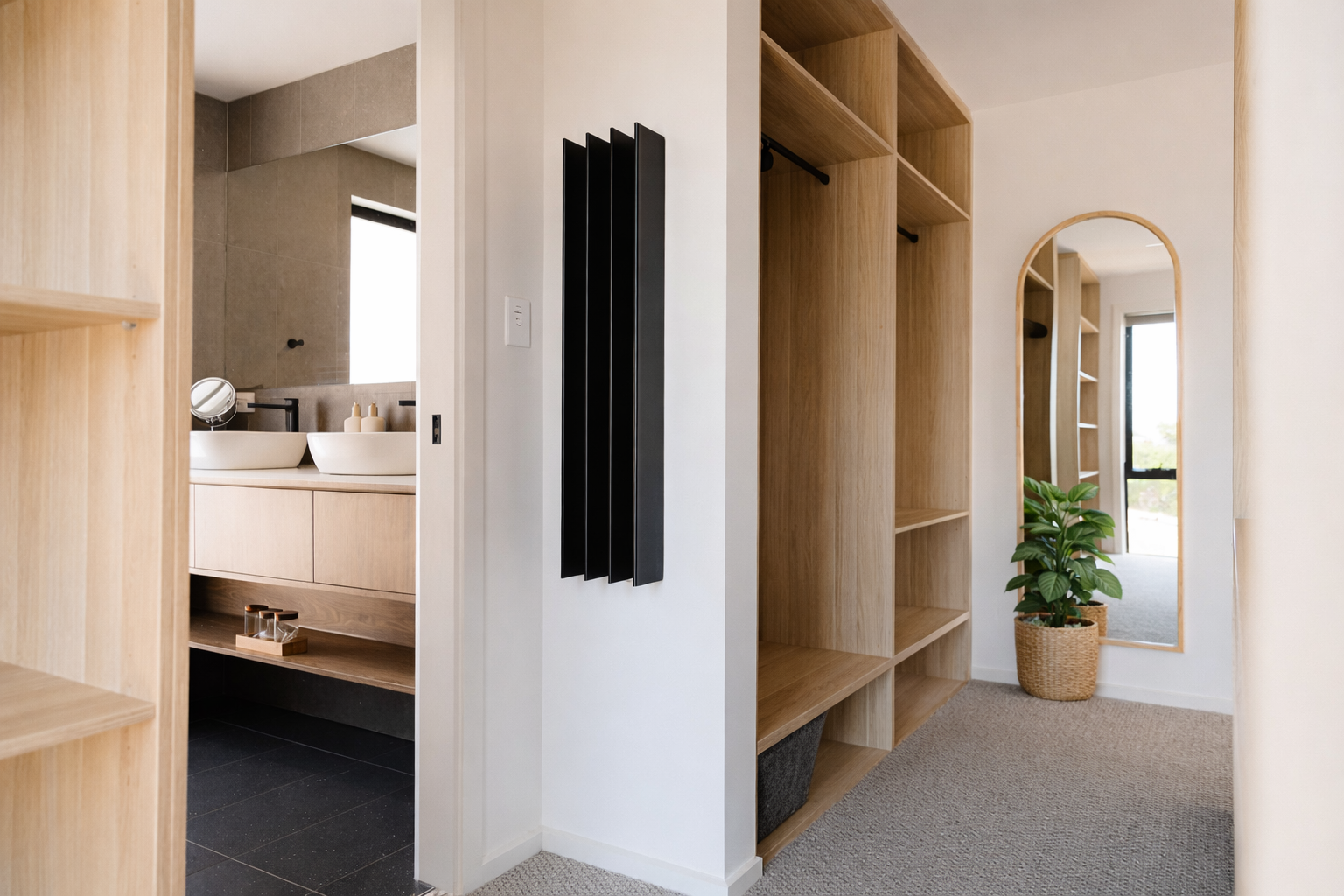 Modern hallway with natural light and greenery.png