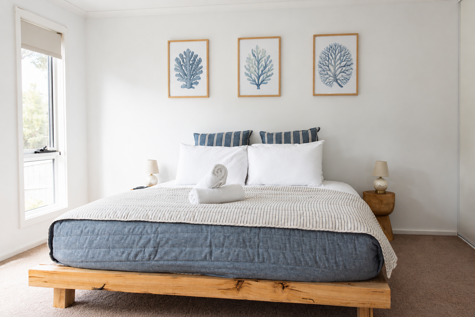 Coastal Calm Bedroom with Coral Art.png