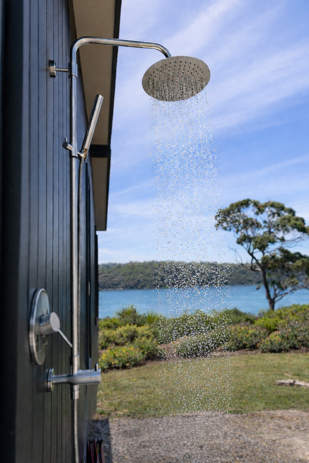 Outdoor shower with coastal view.png