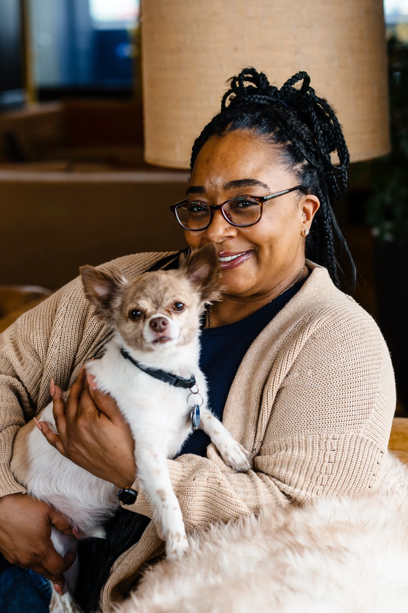 LaTina Rencher holding her dog, Jax.