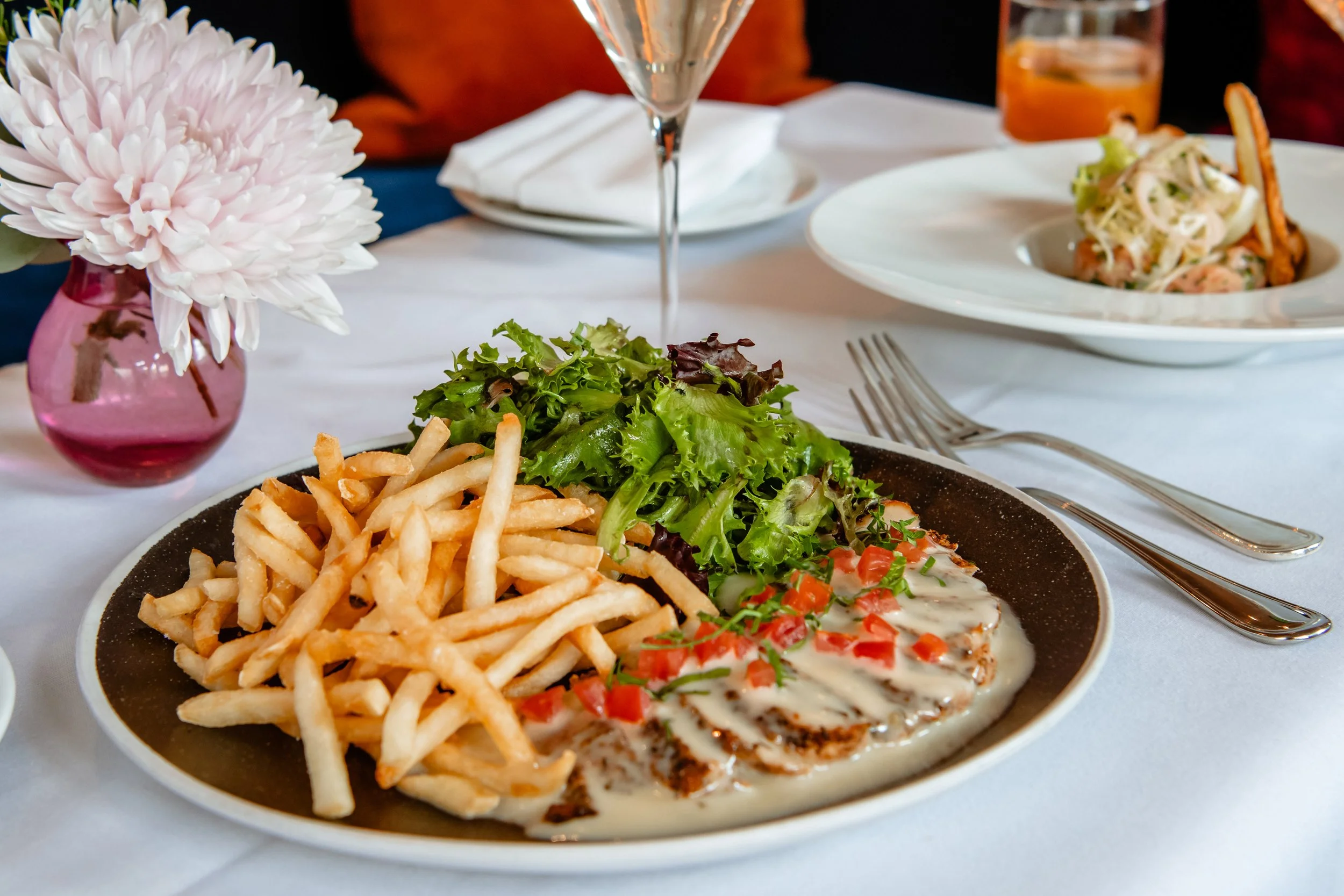 Signature Cajun chicken plate at Le Bilboquet French bistro in Denver