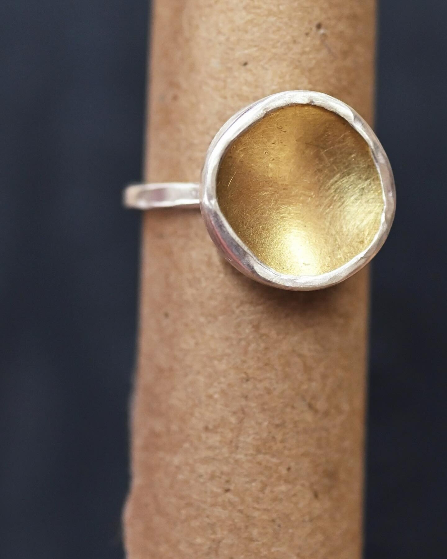 The Cavo Ring, a little concave bowl of warm + glowy brass set in sterling 💛