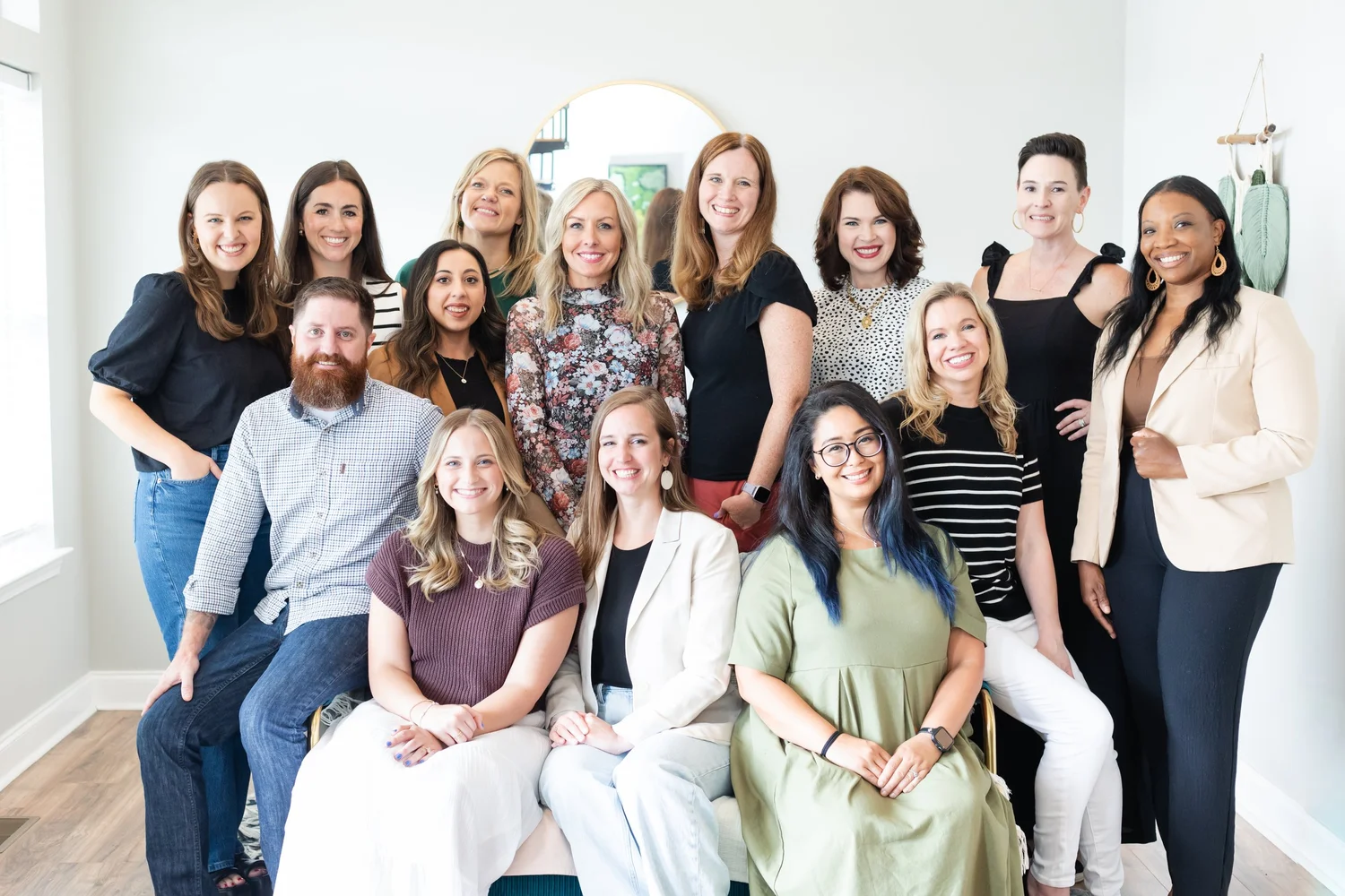 The Soul Story Therapy team of therapists smiling together in the Helena office