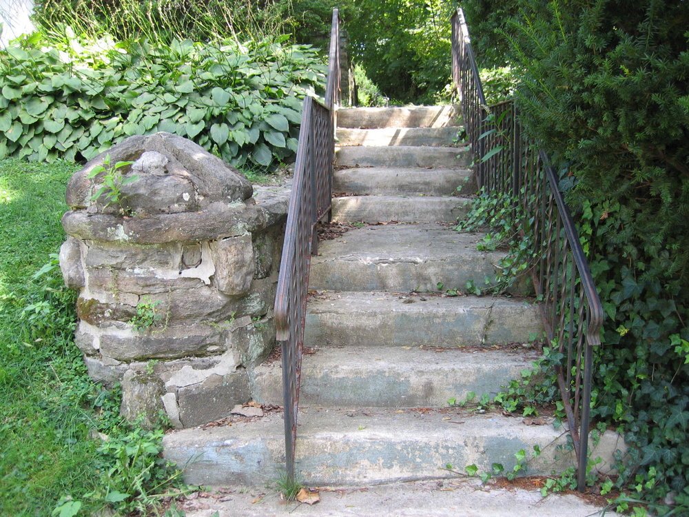 Before - The front steps were covered over in cement and the pillar was crumbling