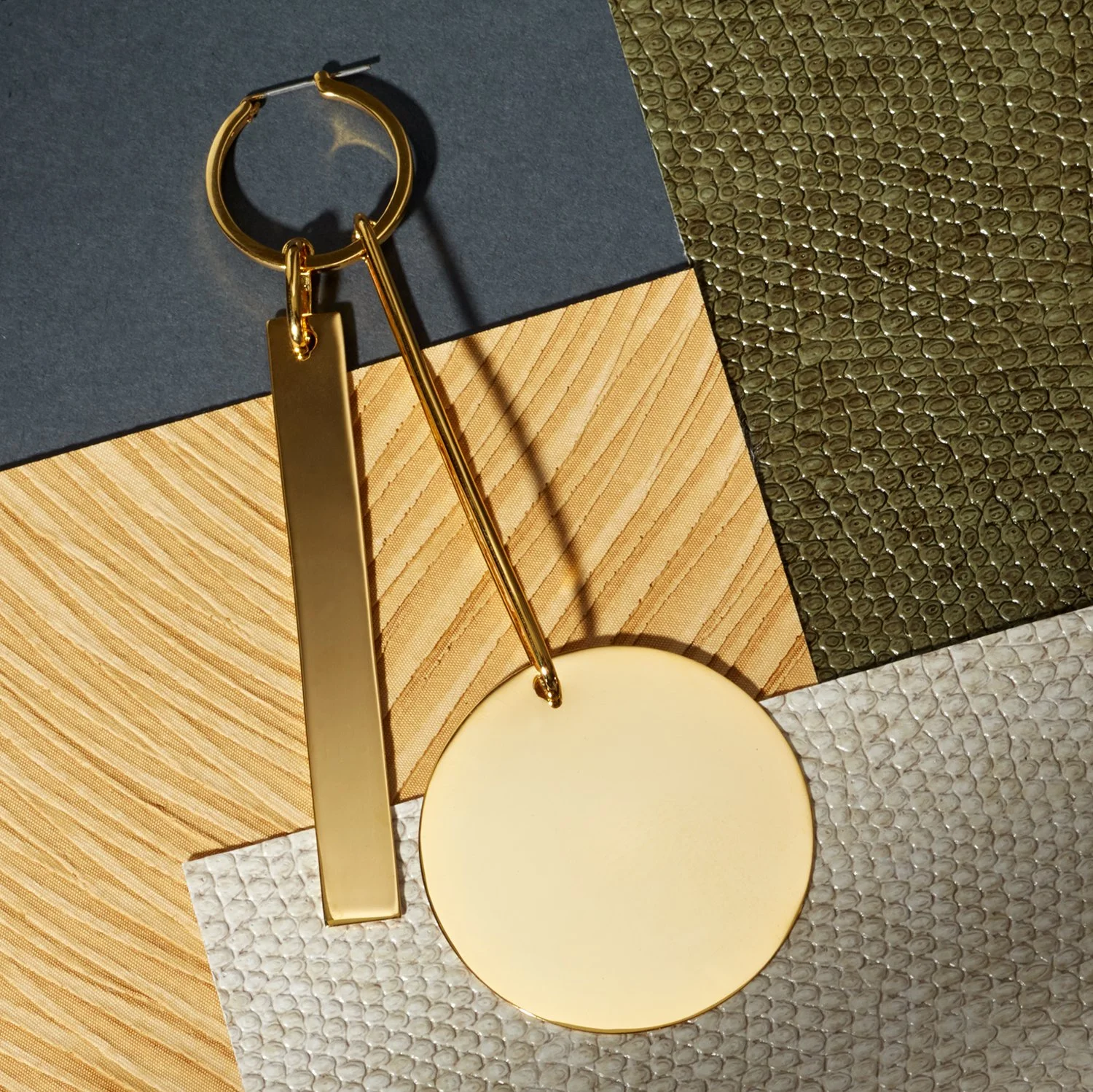 pcook-tibi-gold-earring-single.jpg