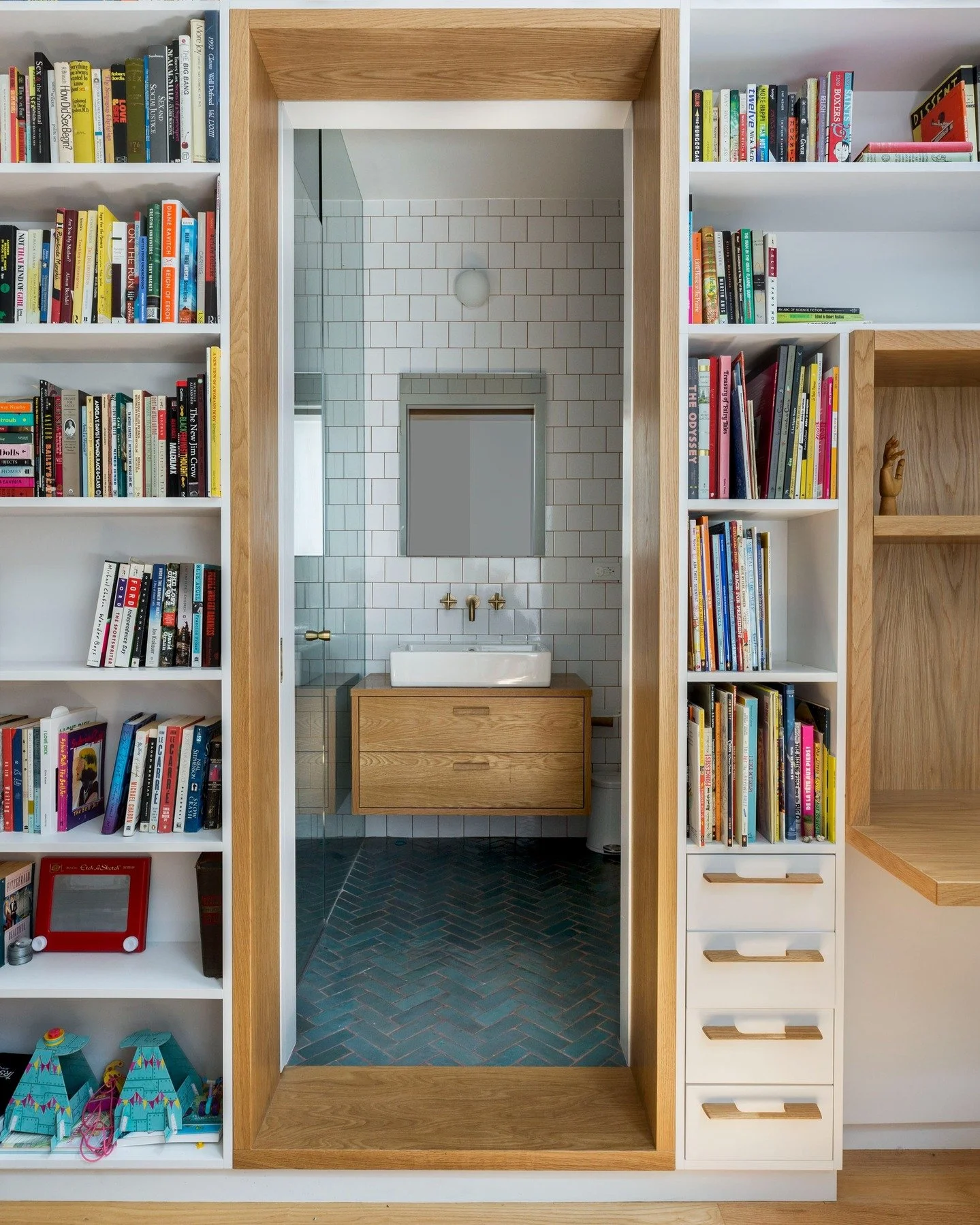 We love all our clients&mdash;especially the littlest ones. Children&rsquo;s spaces ask for a different kind of attention, open enough to spark creativity, special enough to feel like a place of their own. This compact library and desk offer a calm s