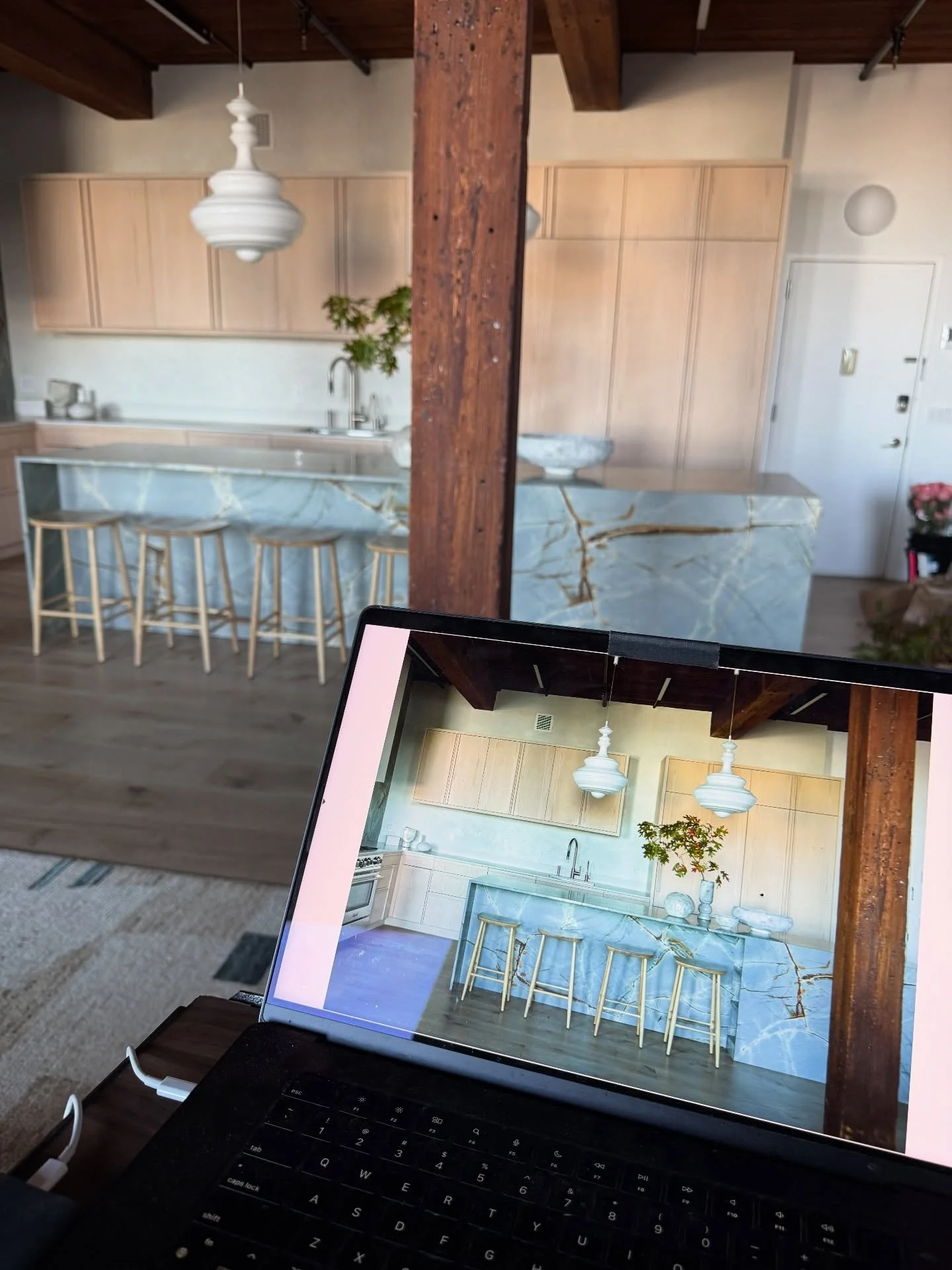 A few moments from our recent photoshoot with @skylersmith and @pammorris Afternoon golden light pours into this river facing loft transforming the space. We even snuck in a quick portrait session in our favorite chair. 

#boleearchitects #apartmentr