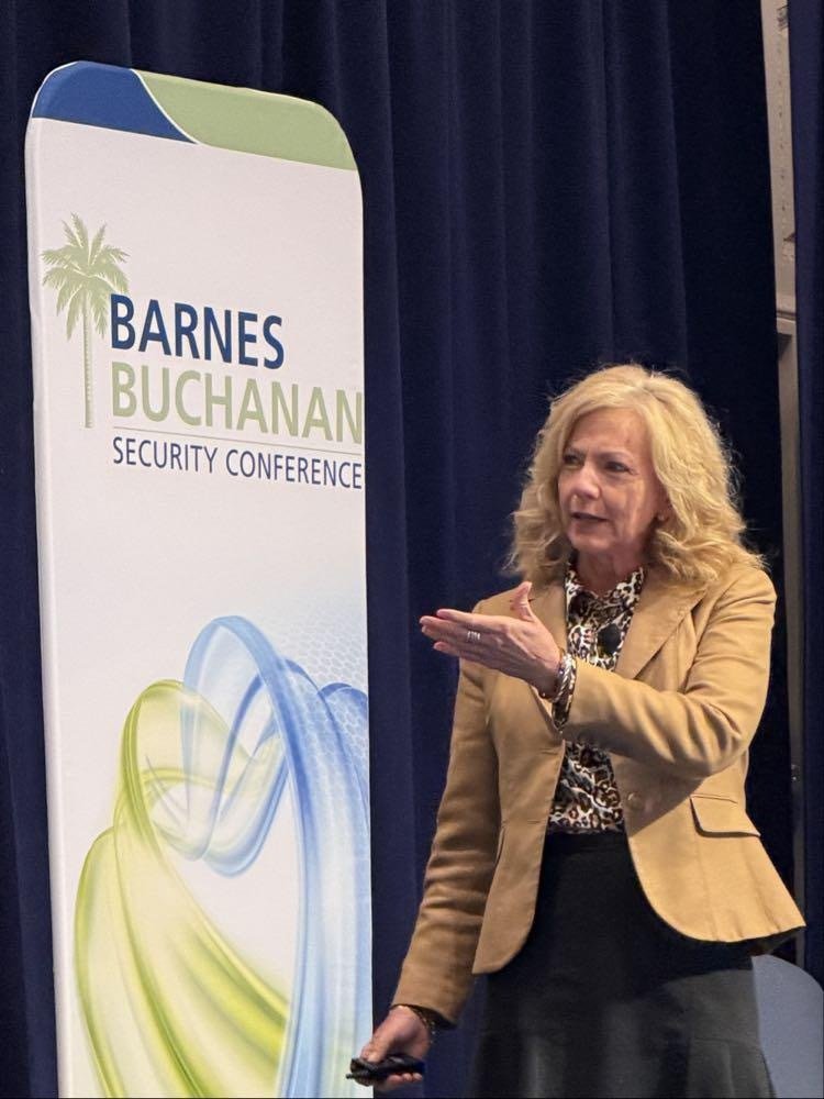 Woman speaking with gesturing with hands.