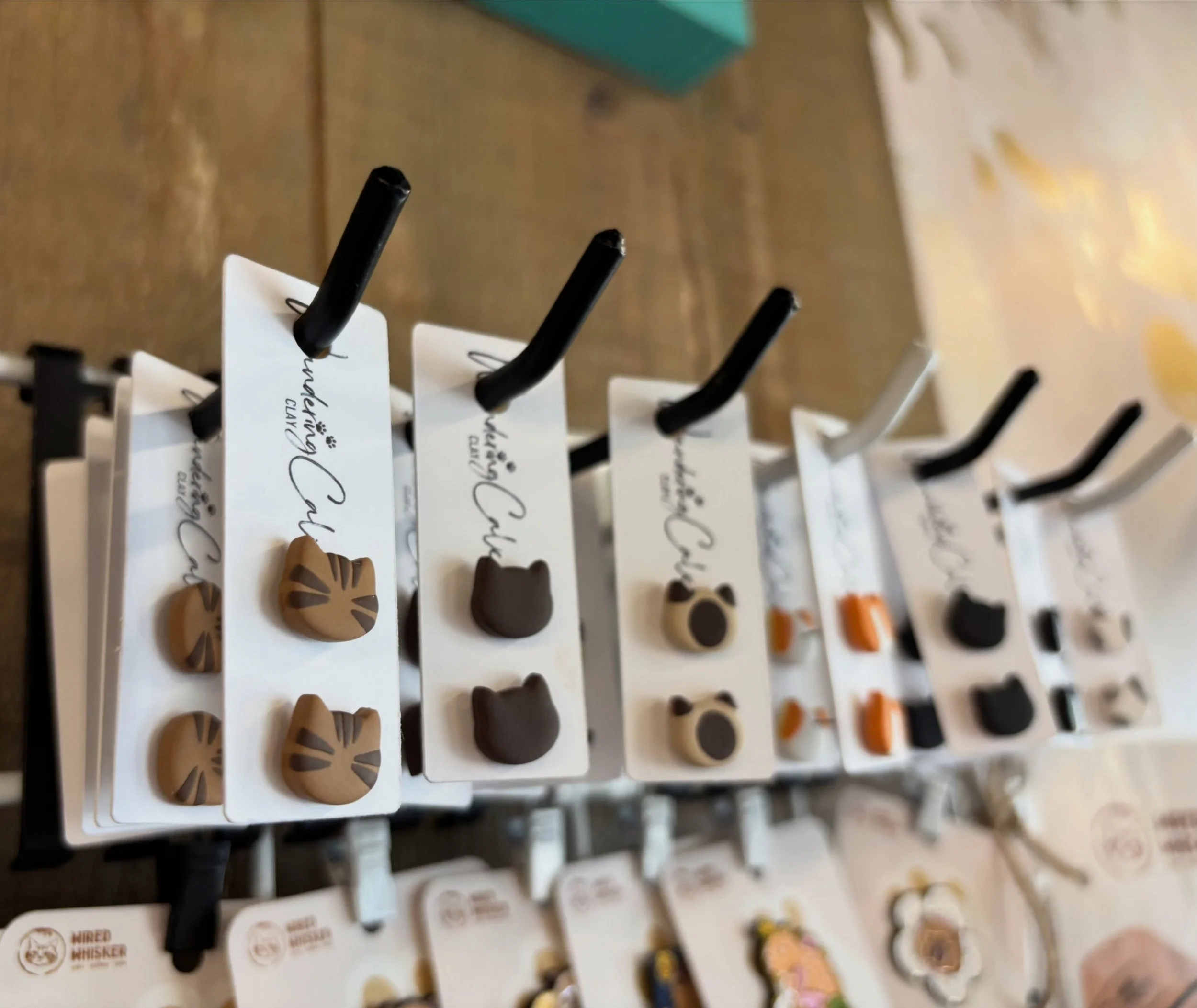 We love representing our cats with a pair of earrings to match them! These handmade earrings are a BEAUTIFUL way to show off your love for cats 😍🐾

Stop in to browse the styles we currently have in stock!

 @ellieparkerceramics @wanderingcalicoclay