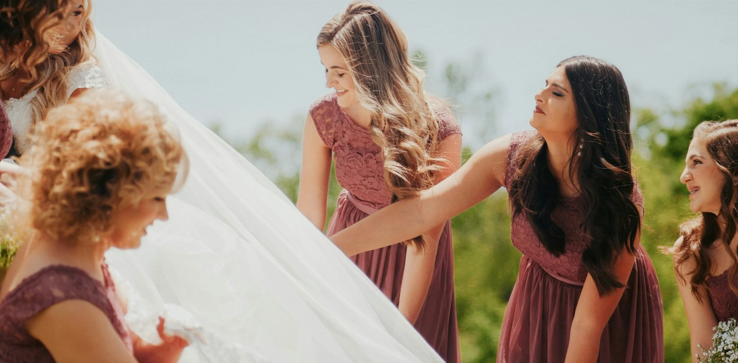 Laurie’s customers, Fernando and Kate embracing by the lake on their wedding day.