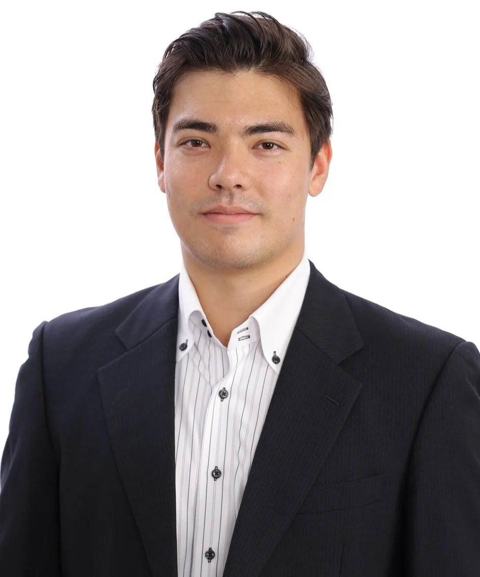 Man in suit and white shirt on white background