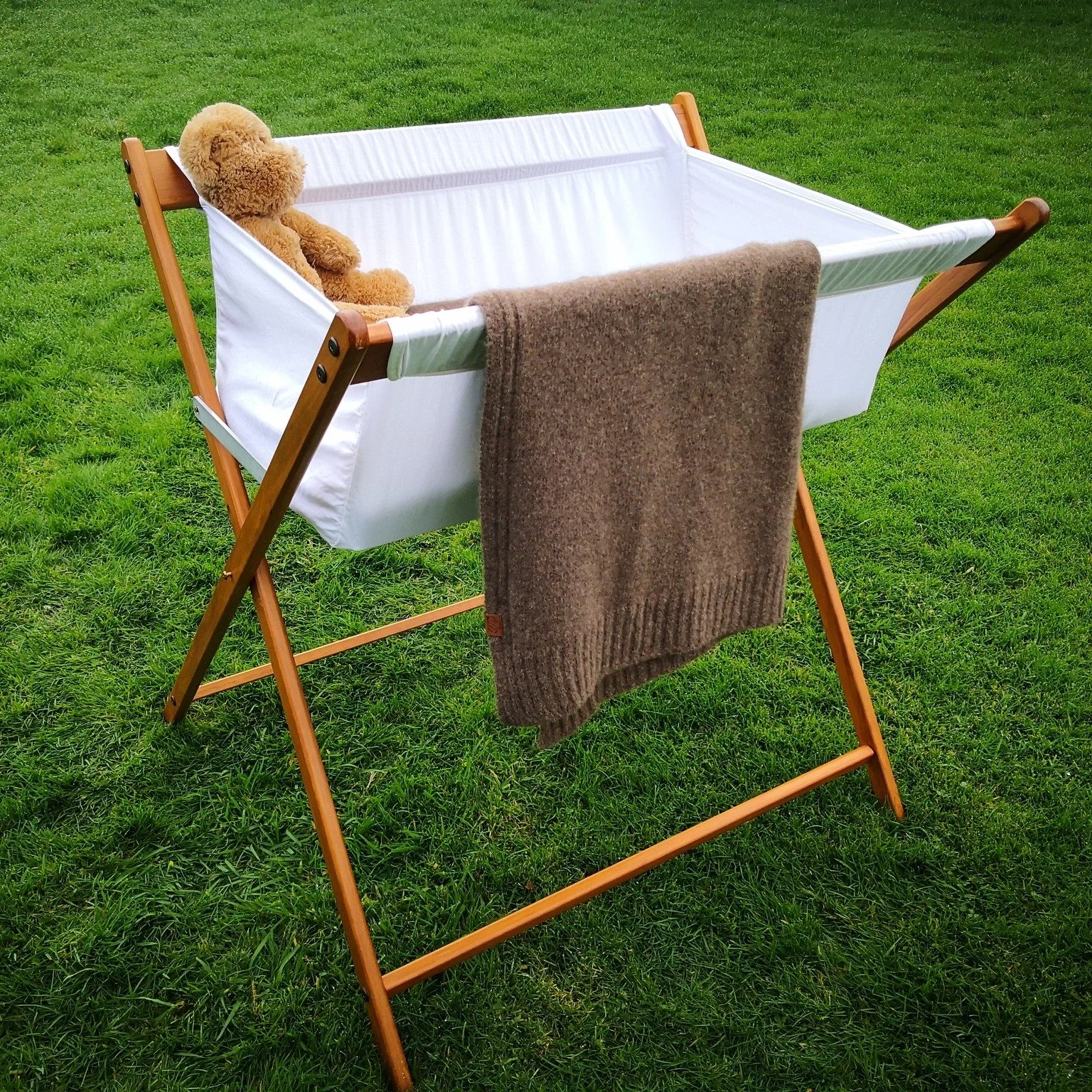 Sunshine, fresh air, and a cosy place to dream. 

There&rsquo;s something special about time spent outdoors with little ones - the soft rustle of leaves, warm light, and simple moments that feel like magic.

Our Wyld baby blanket you see draped over 