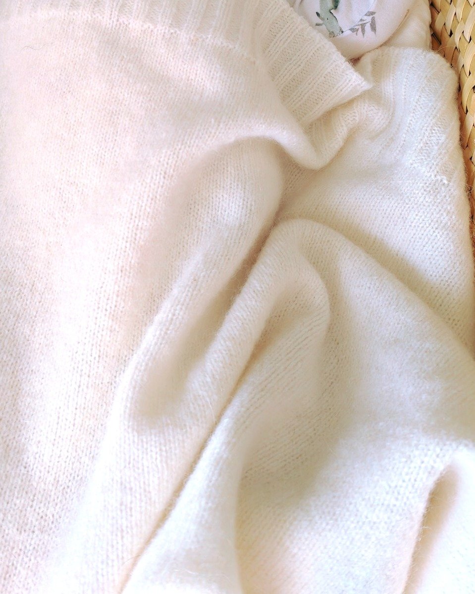 Your favourite baby blanket is back in stock!

- Plain knit with rib edging and subtle cotton tag

- 100 cm x 70 cm - slightly smaller than Wyld baby blanket

- Perfect size for swaddling your little one, or using as a cosy wrap or in a car seat, pra