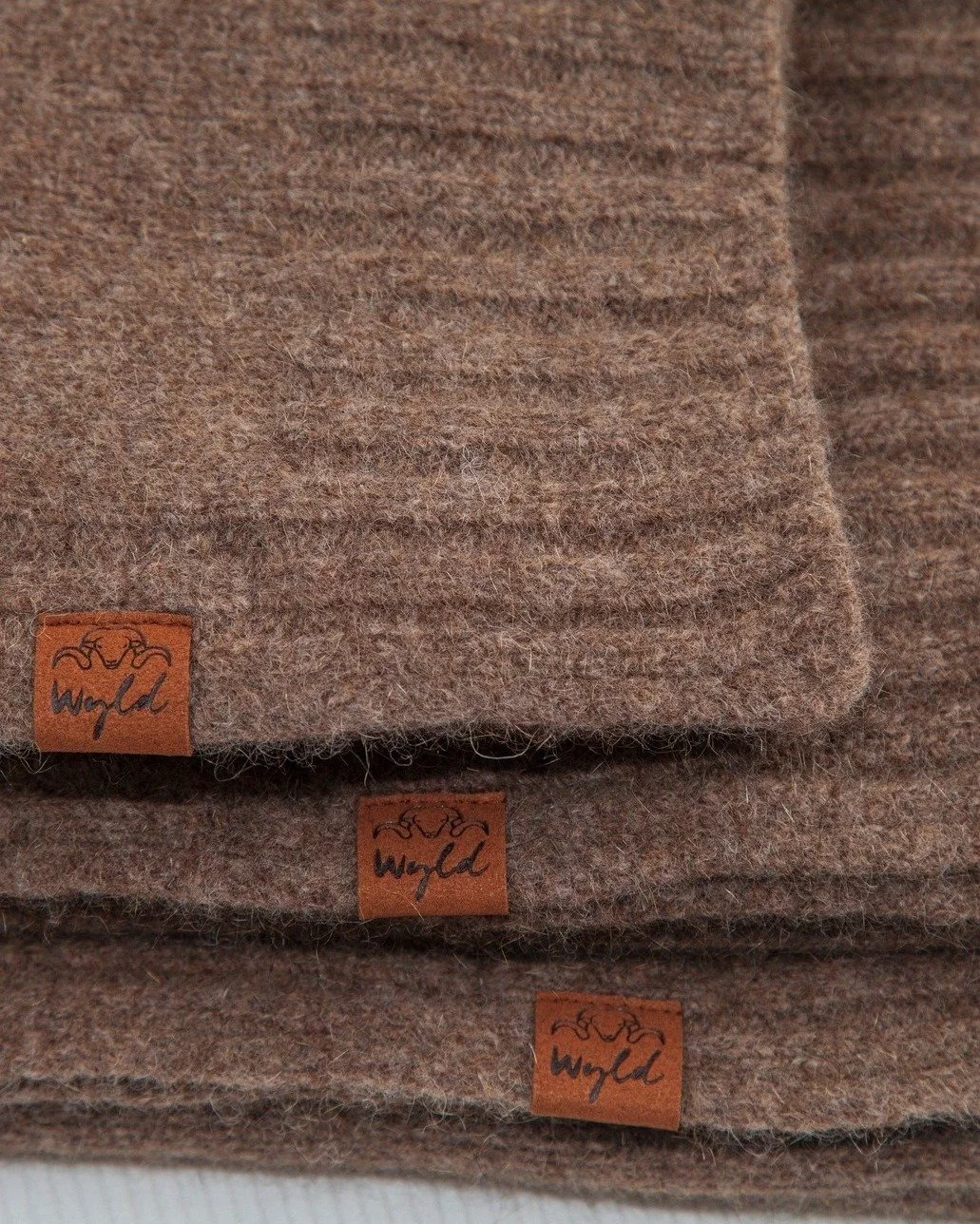 We could dye our wool any colour. We choose not to.

Every shade in our Wyld collection begins exactly where it should...

With the sheep.

Our Pihepe wool has its own beautiful natural brown colour, so there's no need to cover it up.

It means every
