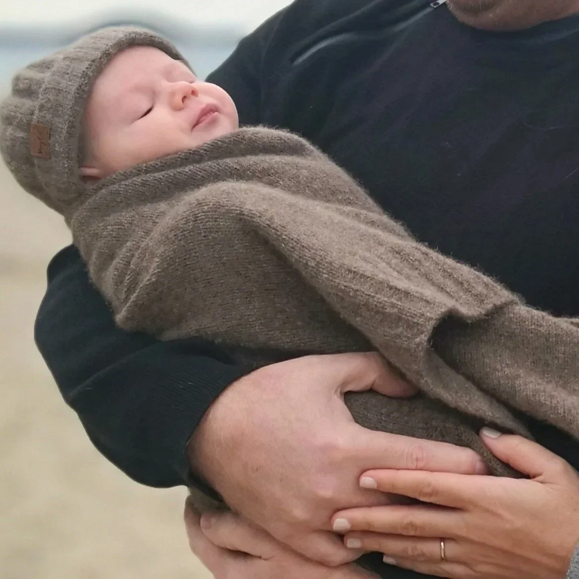Otto+beach%2C+wrapped+in+blanket+and+wearing+hat.jpg