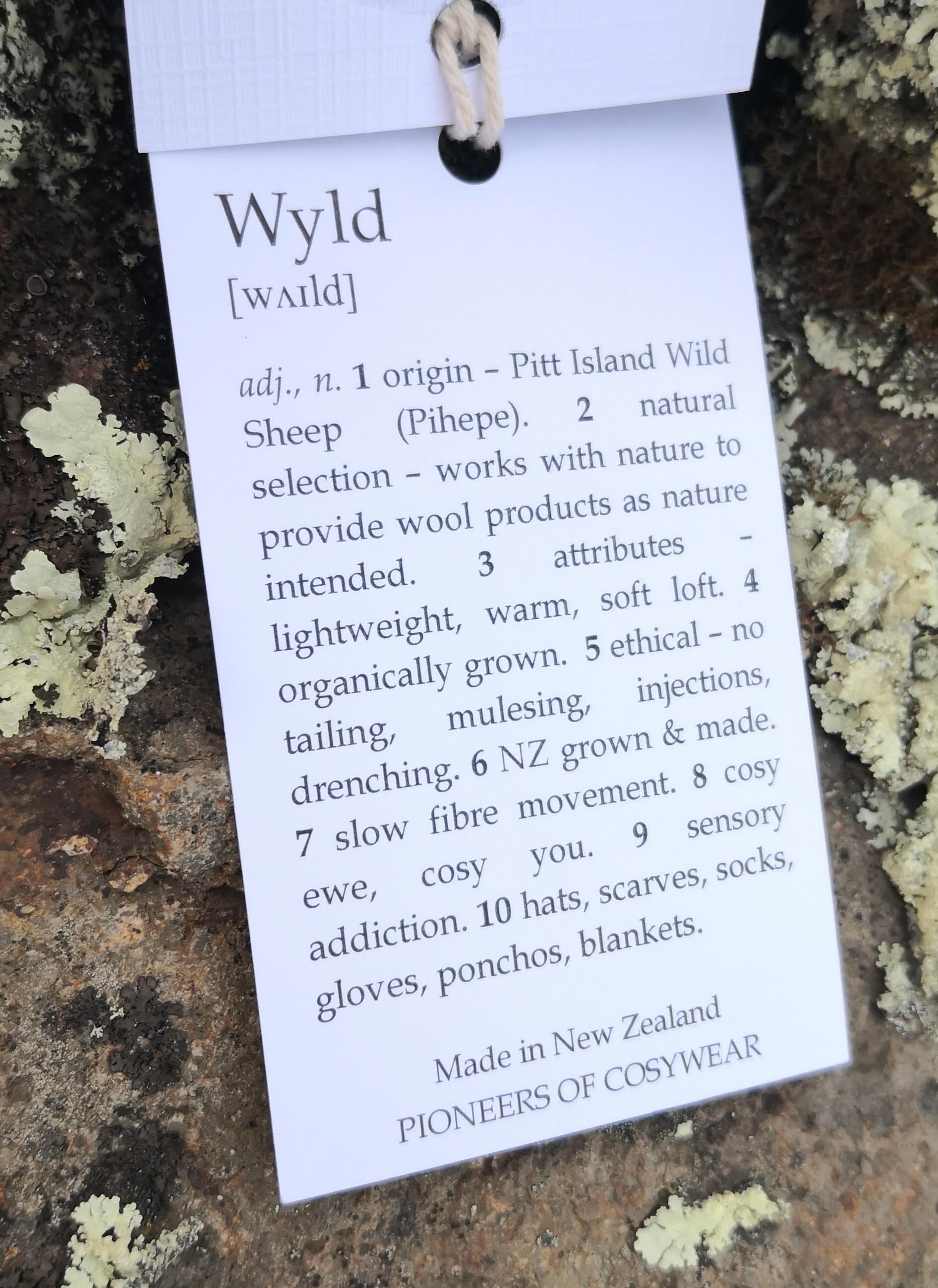 Wyld New Zealand made natural wool clothing tag
