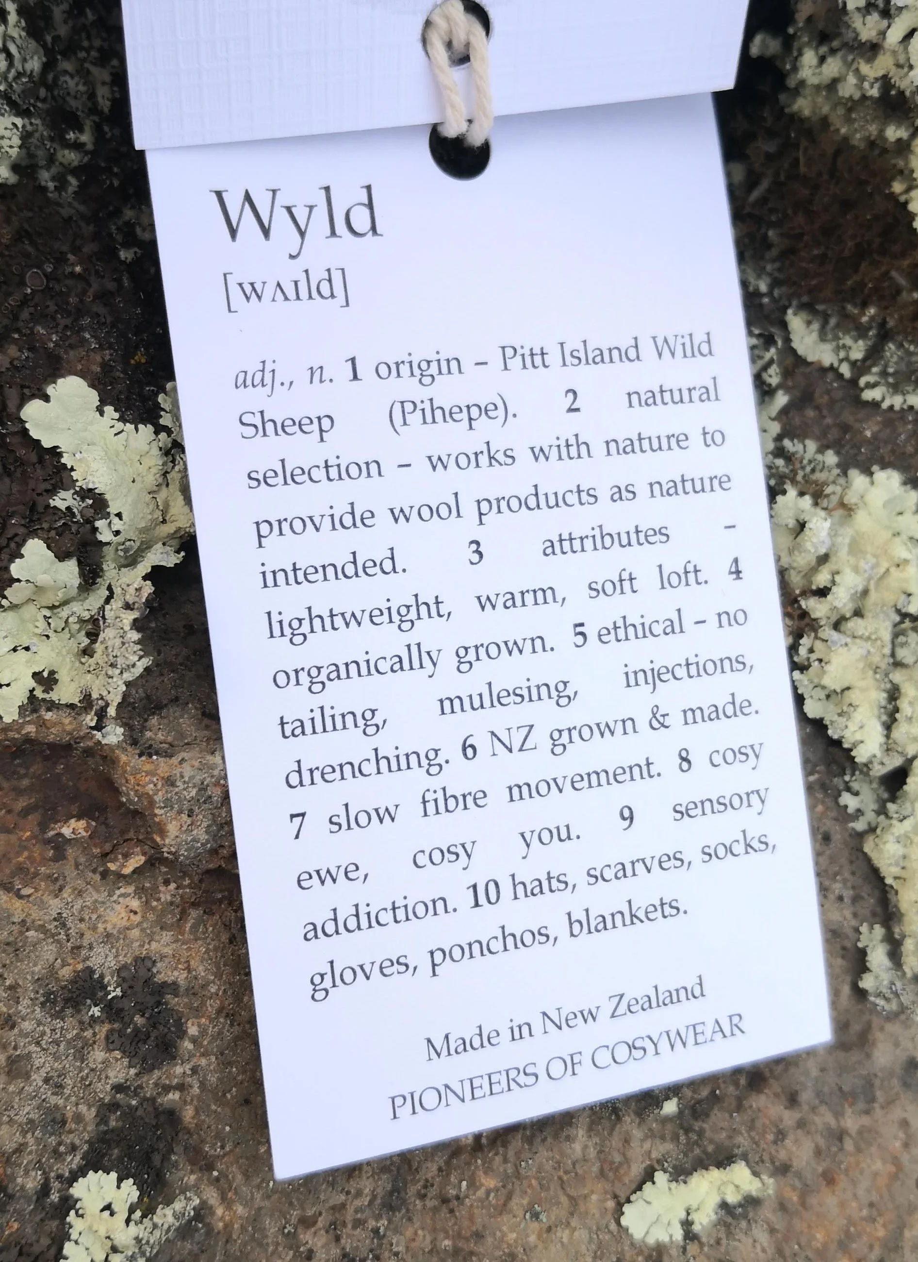 Wyld New Zealand made natural wool clothing swing tag featuring Pihepe Pitt Island Wild Sheep