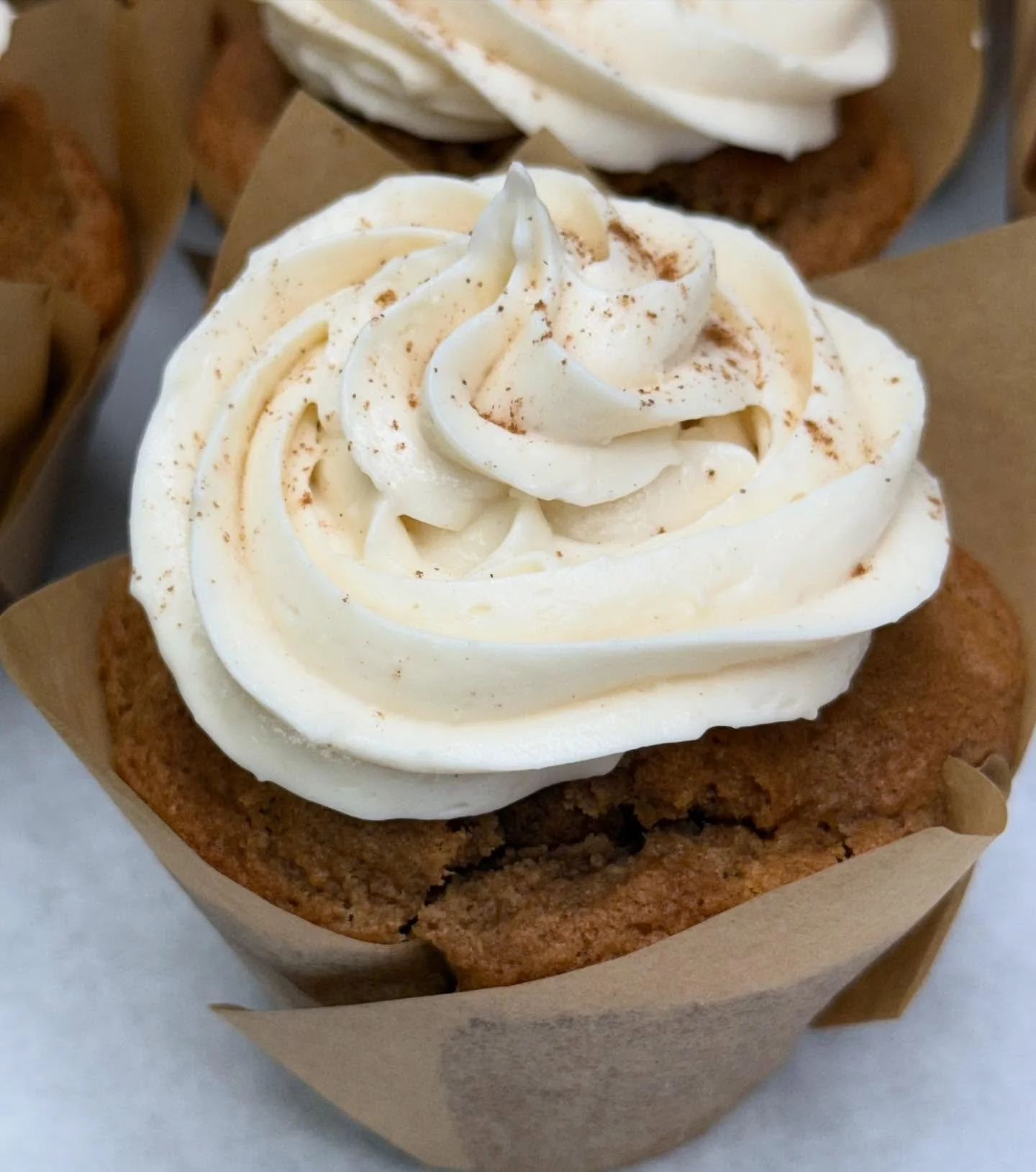 Spiced Apple Cupcake w Cinnamon Cream Chee Whip. #harvestapplespice #cinnamon #tistheseason #sweaterweather #warmcake #lightandfluffy #comforting #comfortfood #local #organic #delicious #happycakes #happythursday #happyluncheonette
