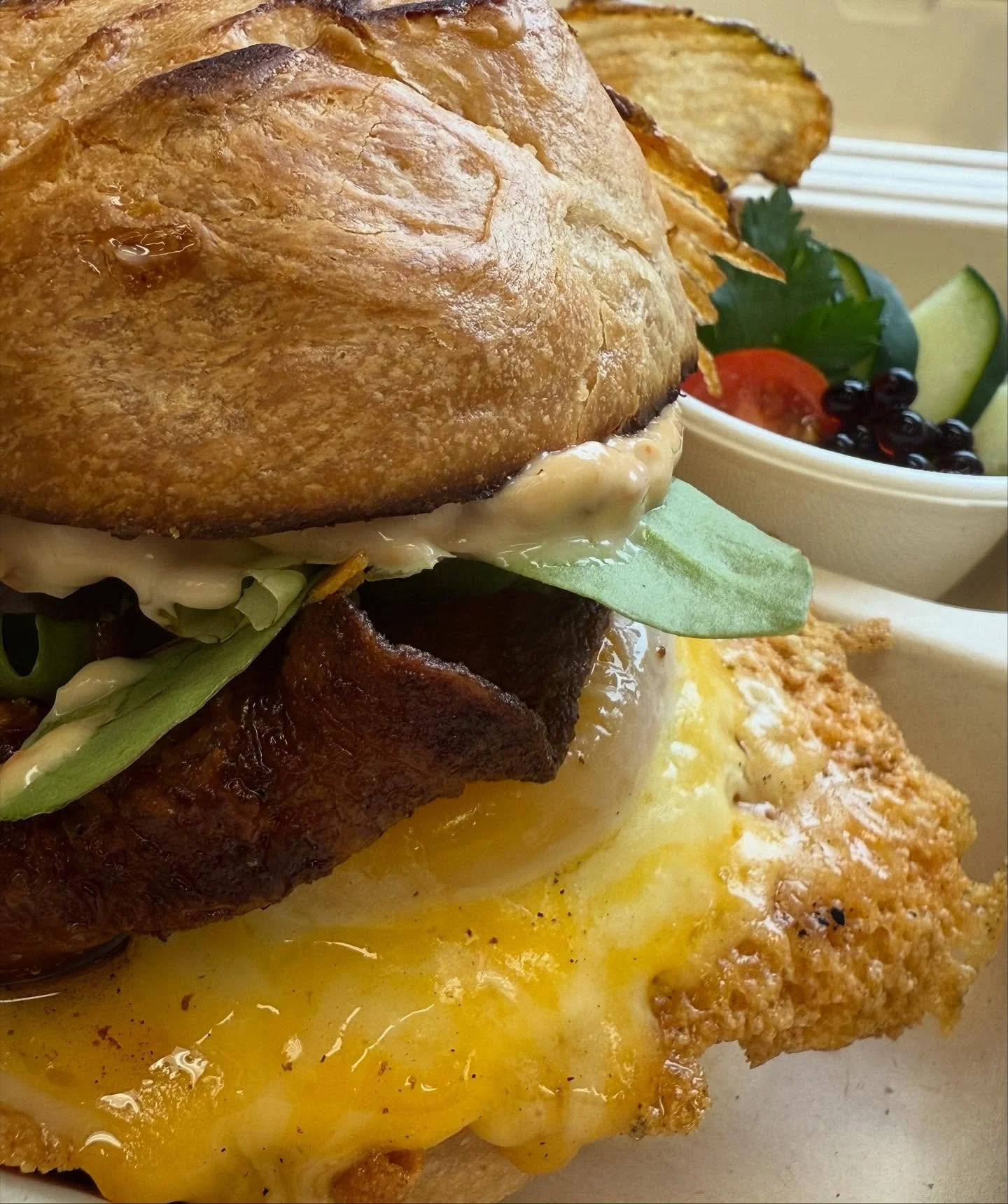 That egg about to bussst. #friedeggsandwich #handslicedpotatochips #verysmallsidesalad #local #organic #delicious Farm Eggs from @ittybittyacresfarm #sofresh #happyluncheonette