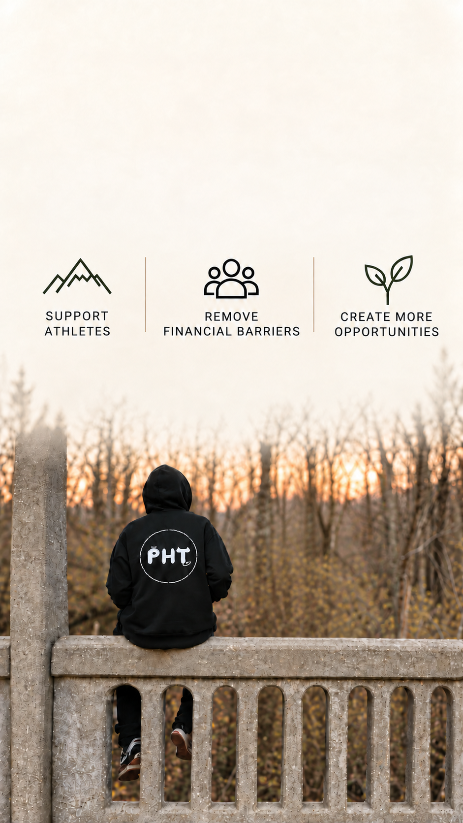 Phantom Action Sports athletes wearing black PHT hoodies on a bridge at sunset