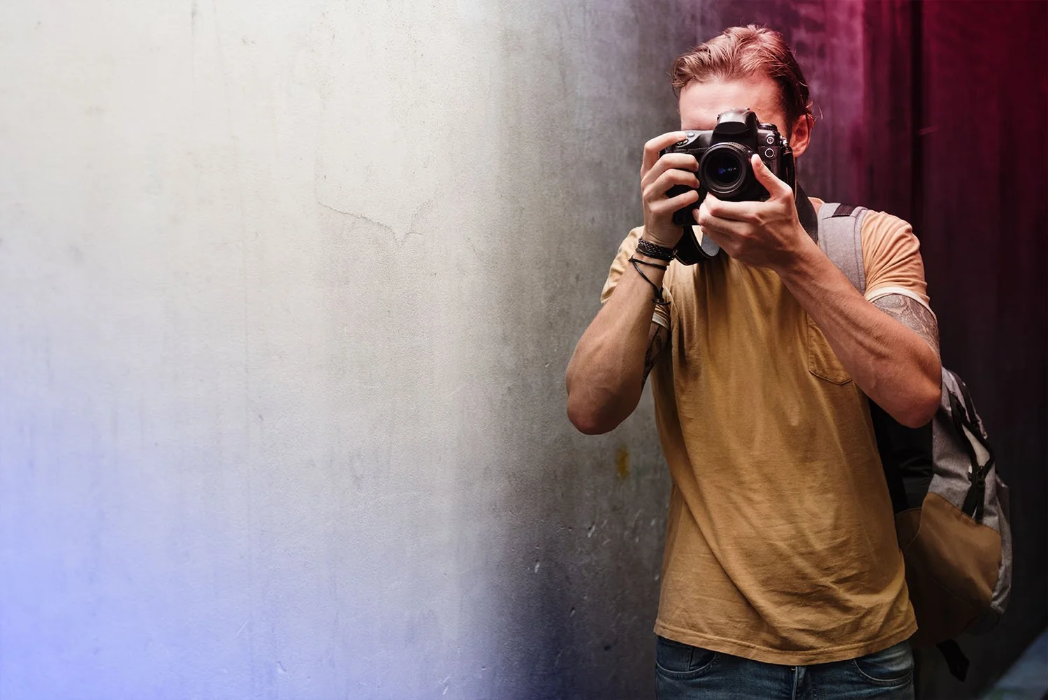 Photographer shooting with a Nikon camera