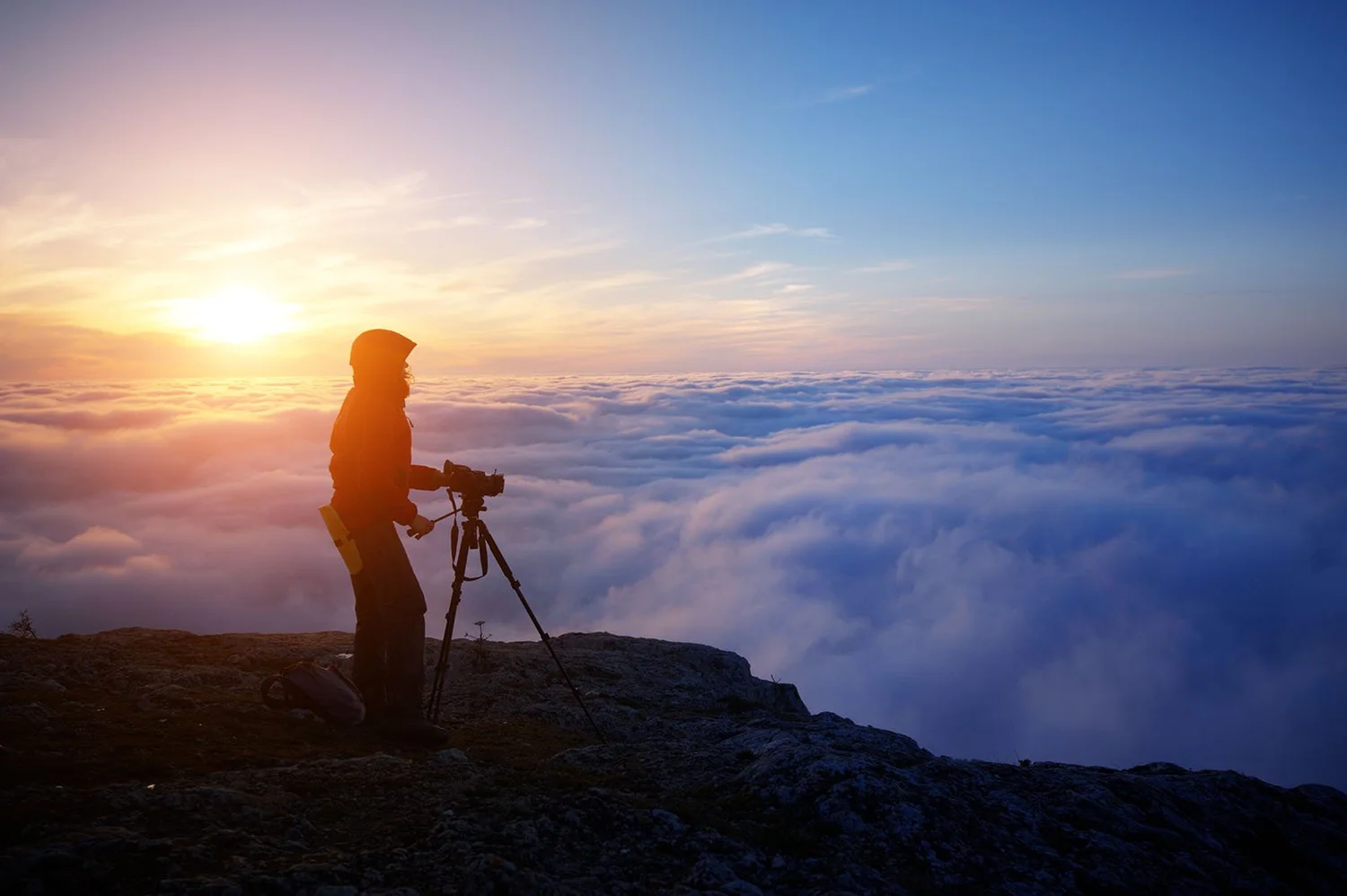 Photographer with rented camera equipment